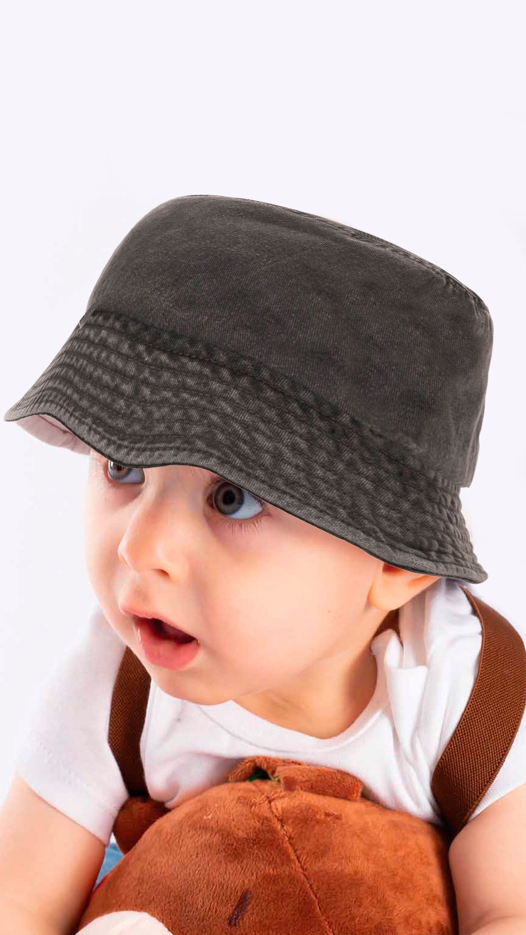 Sierra faded denim bucket hat for kids aged 4-8, featuring a soft and stretchy design for comfort and sun protection.