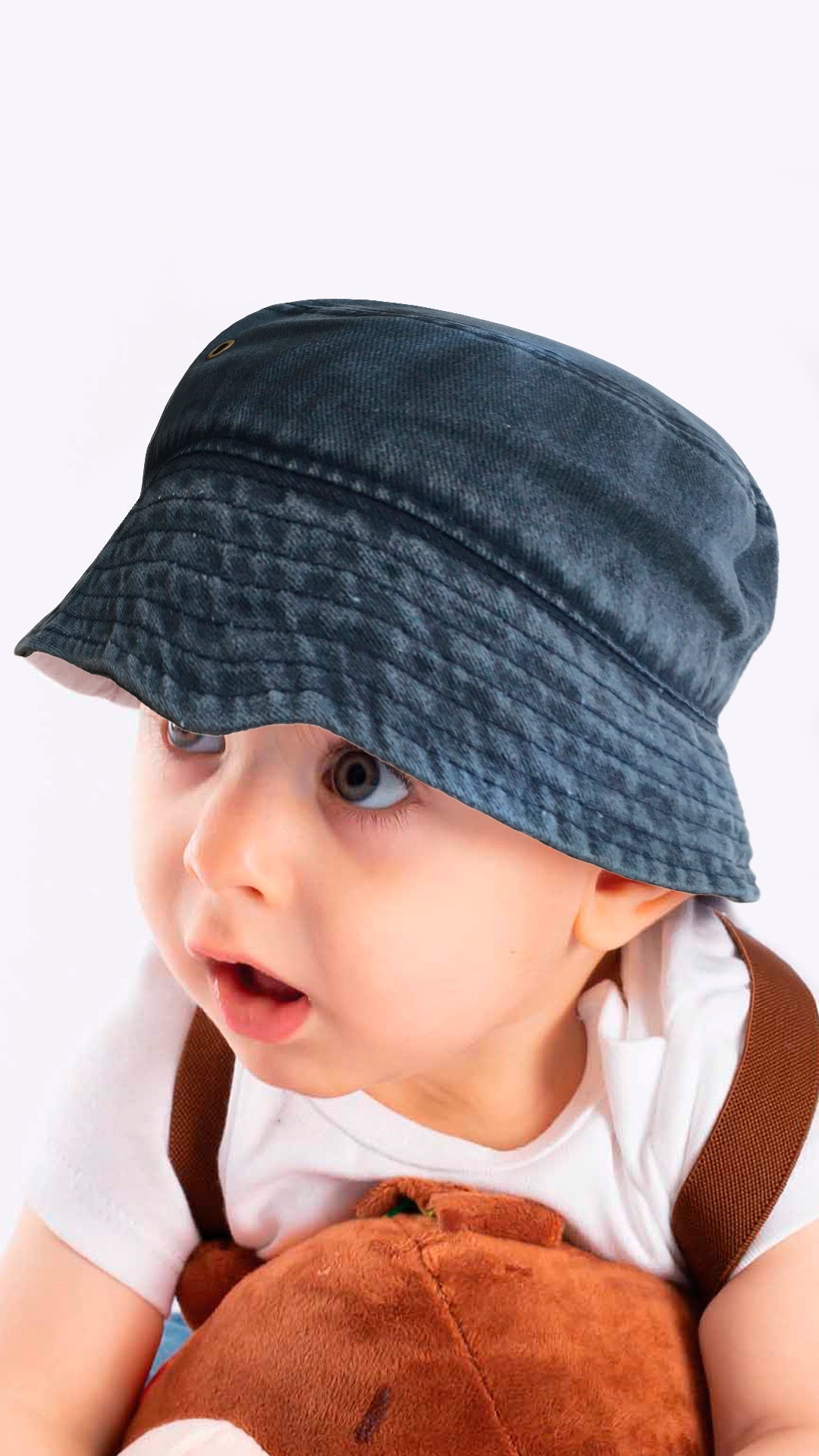 Sierra faded denim bucket hat for kids aged 4-8, featuring a soft and stretchy design for comfort and sun protection.