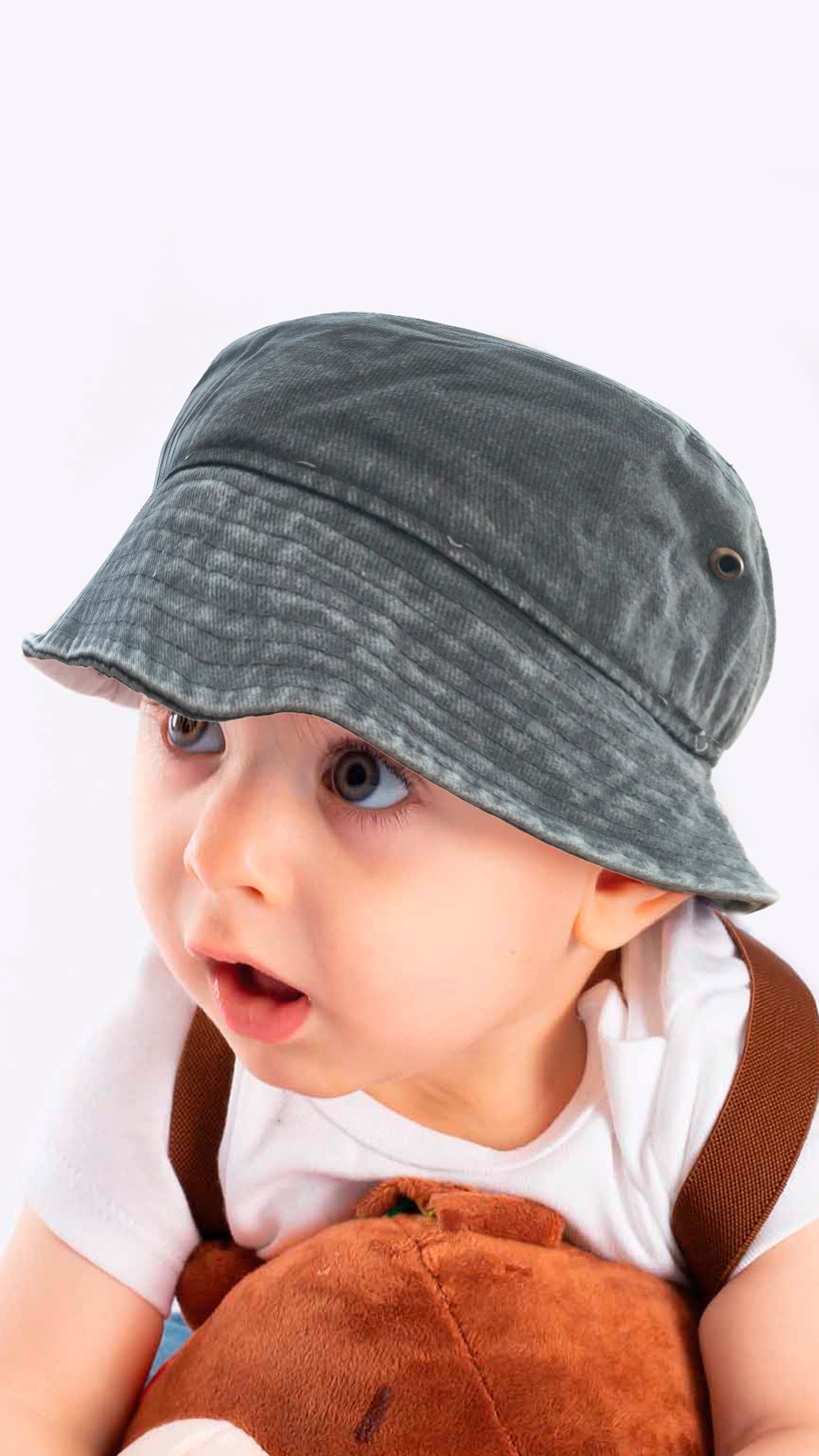 Sierra faded denim bucket hat for kids aged 4-8, featuring a soft and stretchy design for comfort and sun protection.