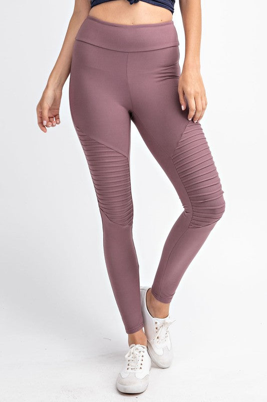 A pair of Butter Soft Moto Leggings featuring stylish moto detailing, high waist, and a key pocket, displayed on a mannequin.