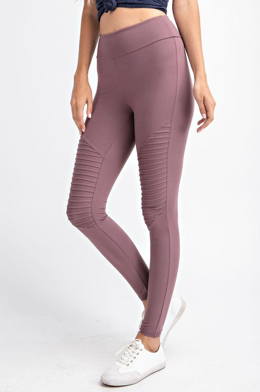 A pair of Butter Soft Moto Leggings featuring stylish moto detailing, high waist, and a key pocket, displayed on a mannequin.