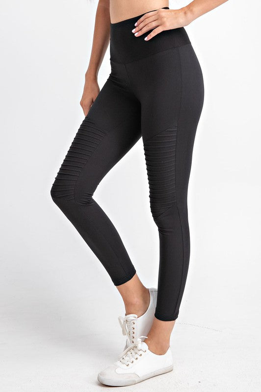 A pair of Butter Soft Moto Leggings featuring stylish moto detailing, high waist, and a key pocket, displayed on a mannequin.