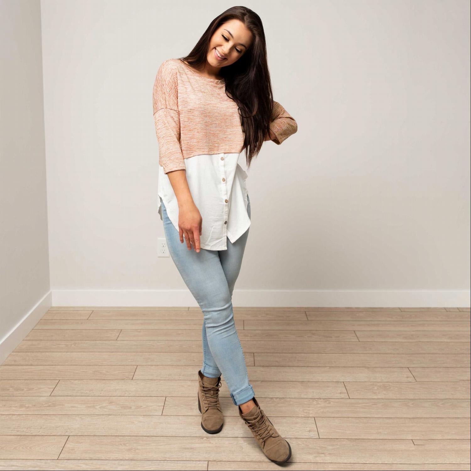 Button Down 3/4 Sleeve Knit Top featuring faux layered design, buttons, and rounded hemline in soft fabric.