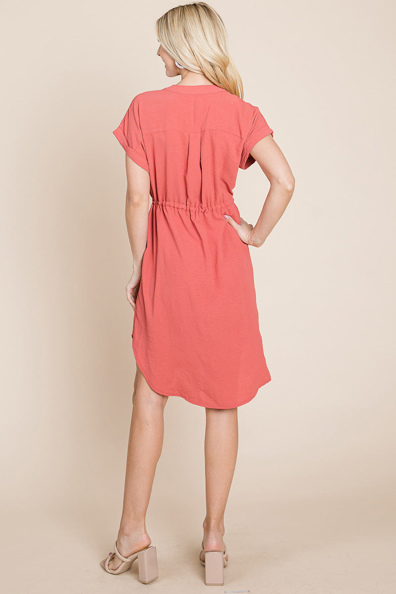 A stylish Button Down Solid Drawstring Waist Shirt Dress featuring dolman short sleeves, a v-neck, and two front pockets, perfect for casual wear.