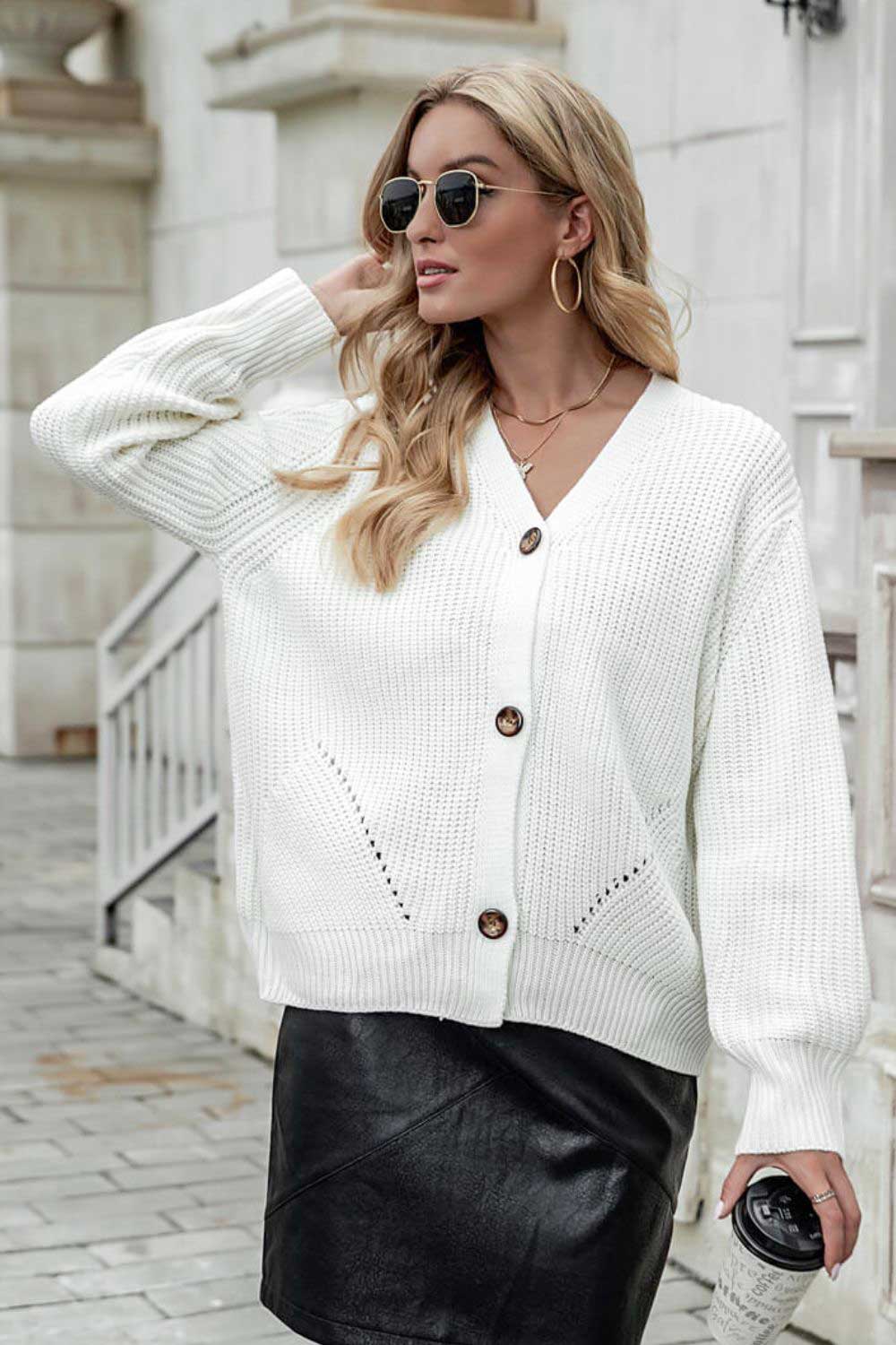 A stylish Button Front Dropped Shoulder Cardigan in solid color, featuring long lantern sleeves and a V-neckline, perfect for casual wear.