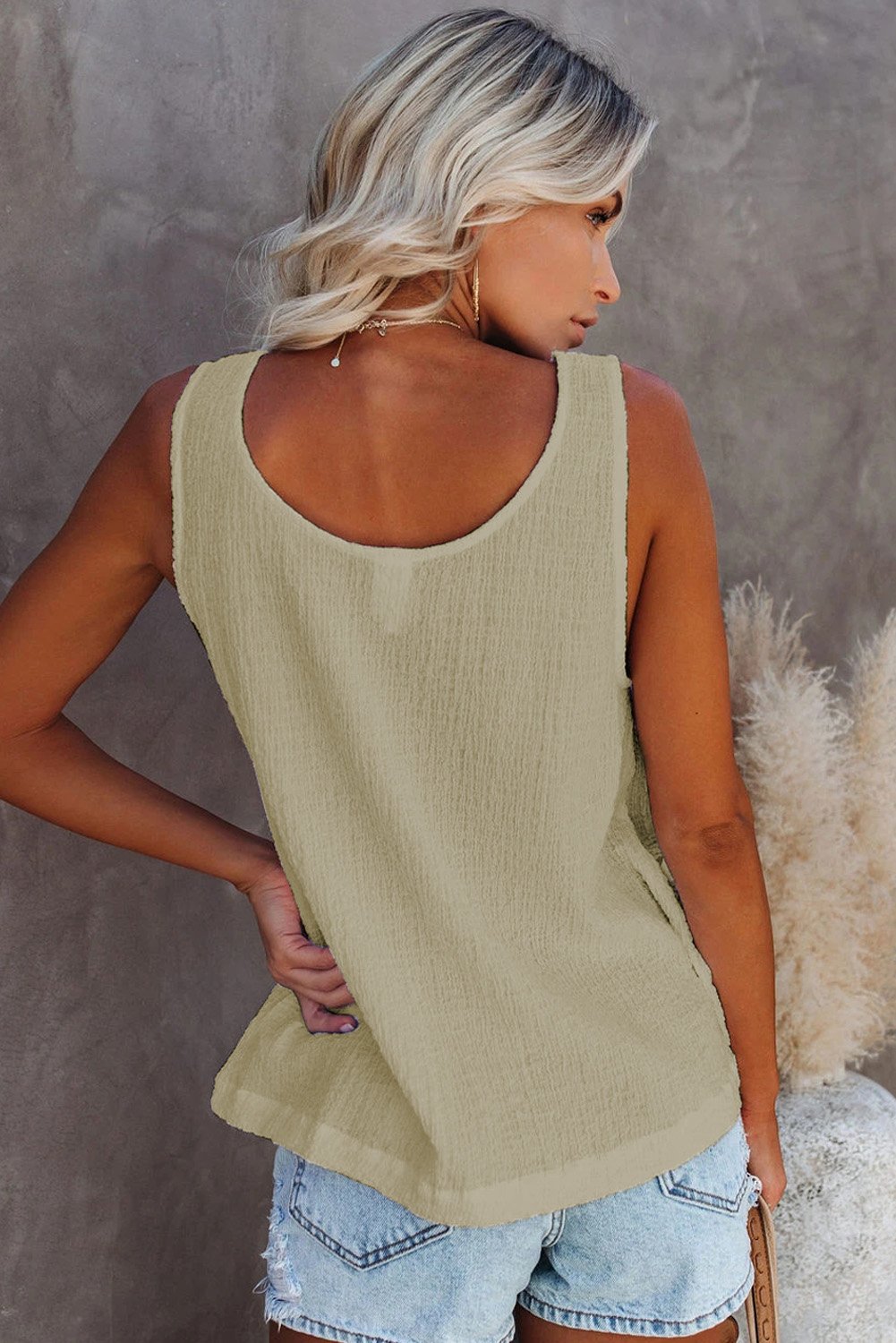 A stylish Button Textured Cotton Tank Top featuring front button closures and a scoop neckline, perfect for casual and party wear.