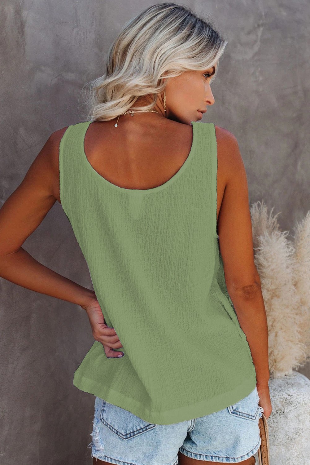 A stylish Button Textured Cotton Tank Top featuring front button closures and a scoop neckline, perfect for casual and party wear.