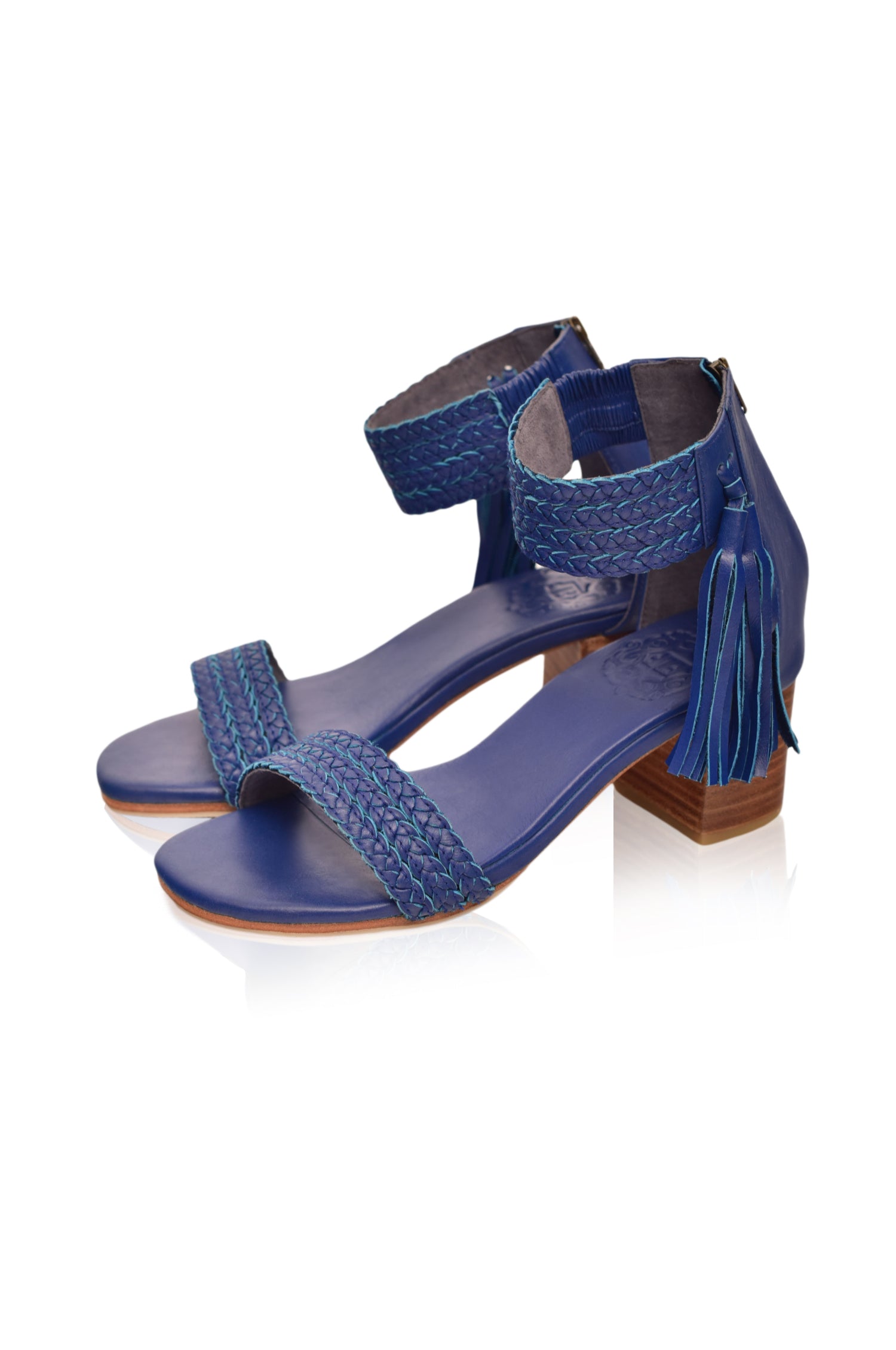 Cabana Tassel Heel Sandals featuring braided leather upper and tassels on ankle cuff, perfect for summer wear.