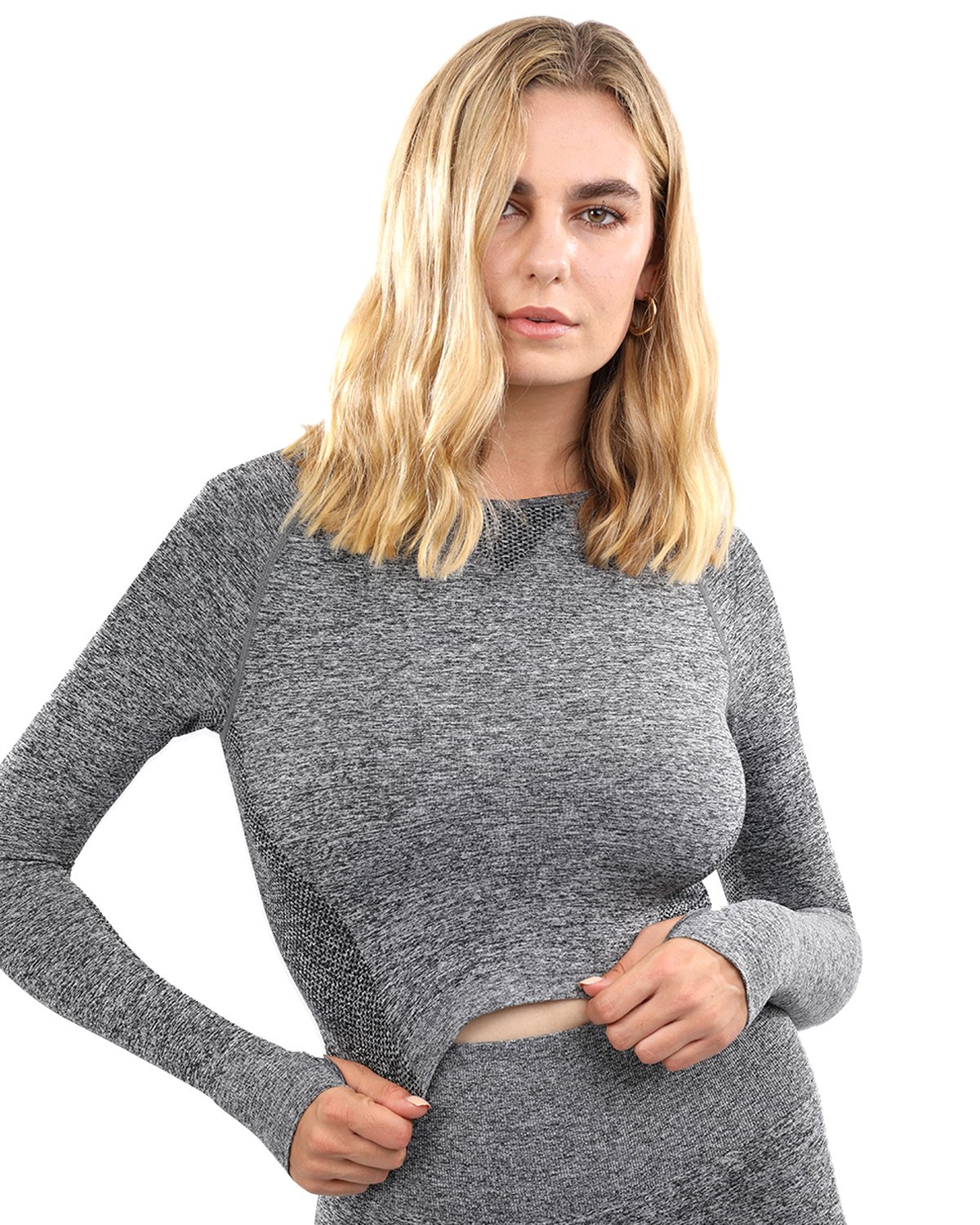 Cadrina Seamless Sports Top in grey featuring long sleeves and thumb holes, designed for comfort and style during workouts.