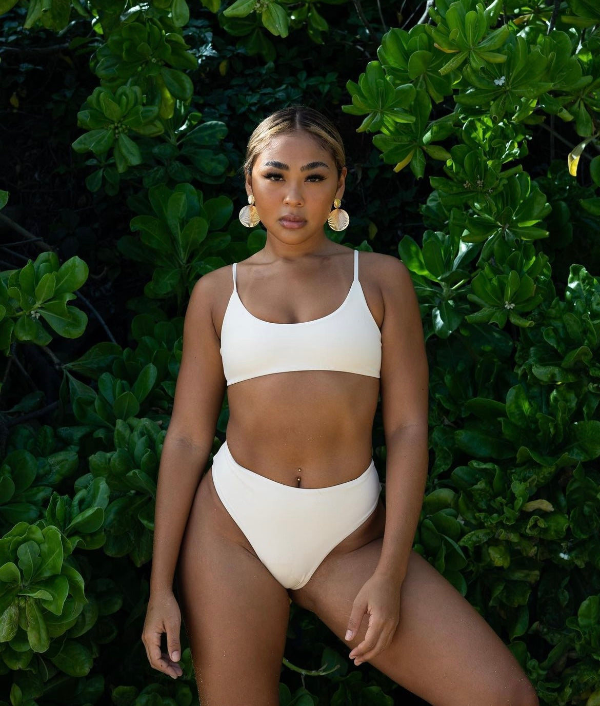 CALI BOTTOMS in Coconut Cream, eco-friendly high-waisted swimwear made from biodegradable fabric, showcasing a soft and stylish design.