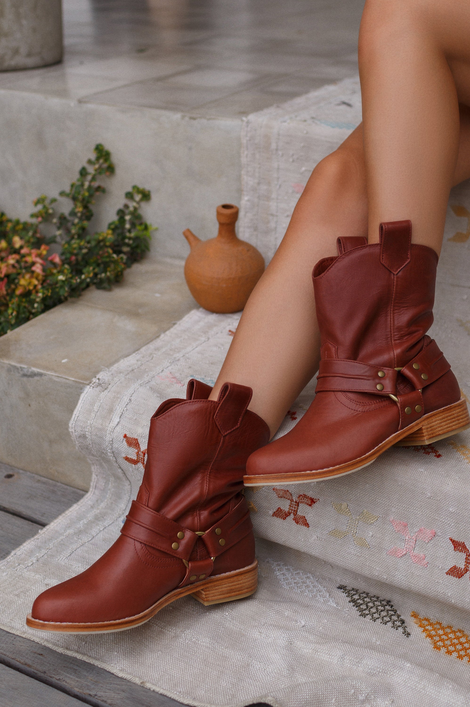 Cali Leather Boots showcasing high-quality leather, rounded toe, and side pull-on tabs, perfect for stylish and comfortable wear.