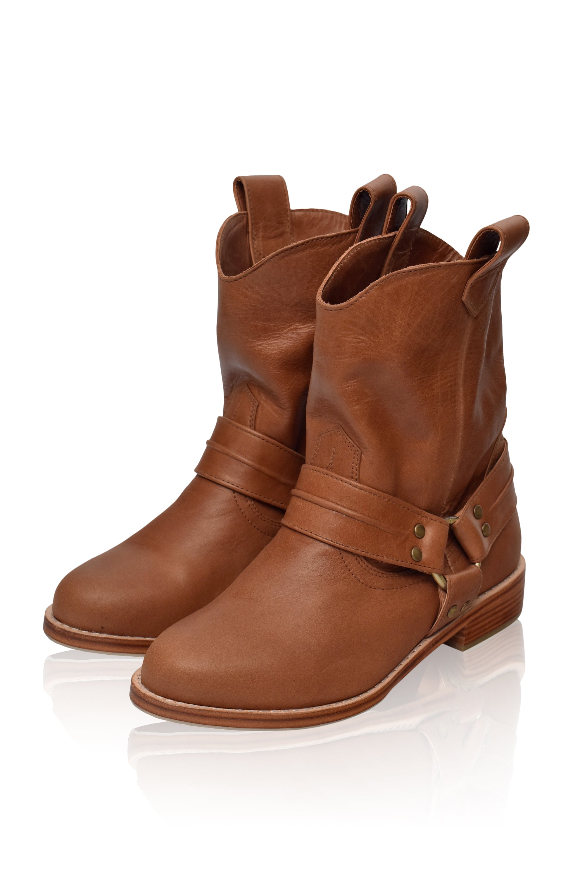 Cali Leather Boots showcasing high-quality leather, rounded toe, and side pull-on tabs, perfect for stylish and comfortable wear.