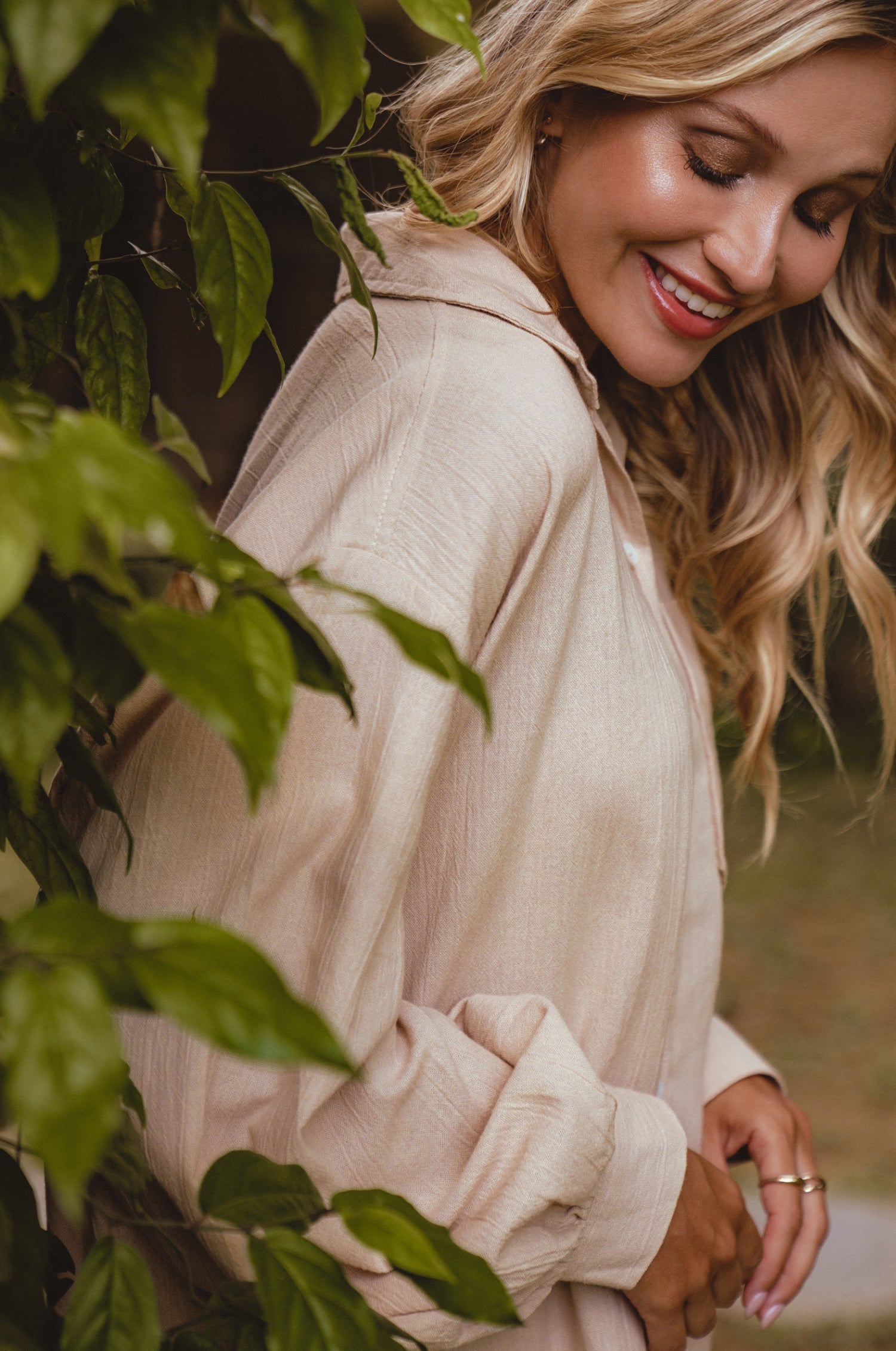 Calin Long Sleeve Oversized Shirt made from breathable linen, featuring a button-down style and high-low hem, displayed on a mannequin.