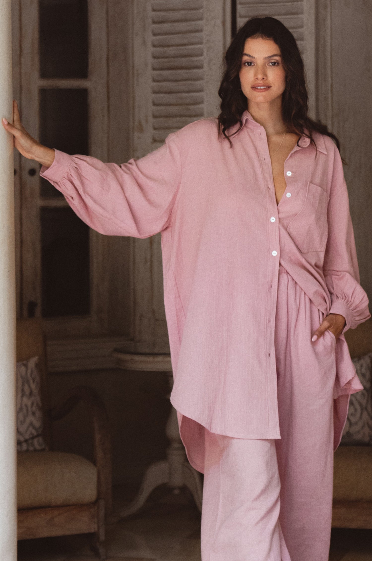 Calin Long Sleeve Oversized Shirt made from breathable linen, featuring a button-down style and high-low hem, displayed on a mannequin.