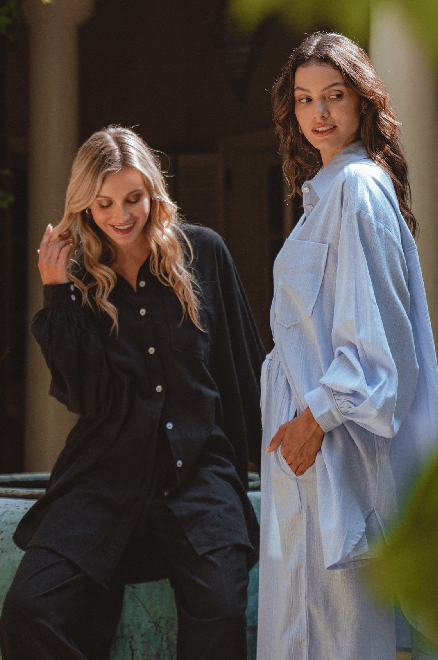 Calin Long Sleeve Oversized Shirt made from breathable linen, featuring a button-down style and high-low hem, displayed on a mannequin.