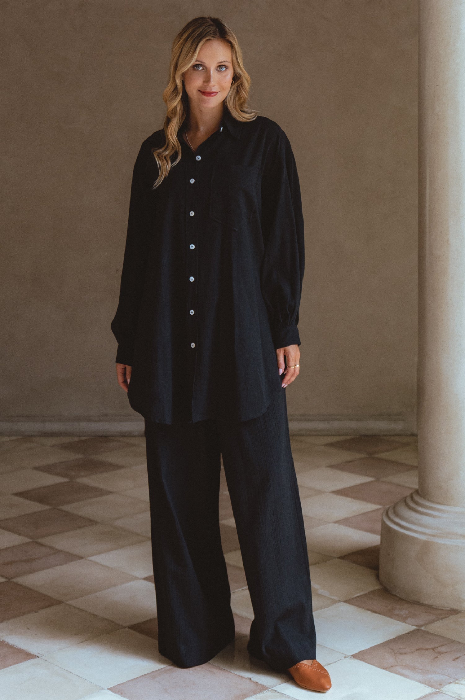 Calin Wide Leg Linen Pants in a chic wide-leg silhouette, featuring a high-rise elasticated waist and dual pockets, perfect for casual outings.