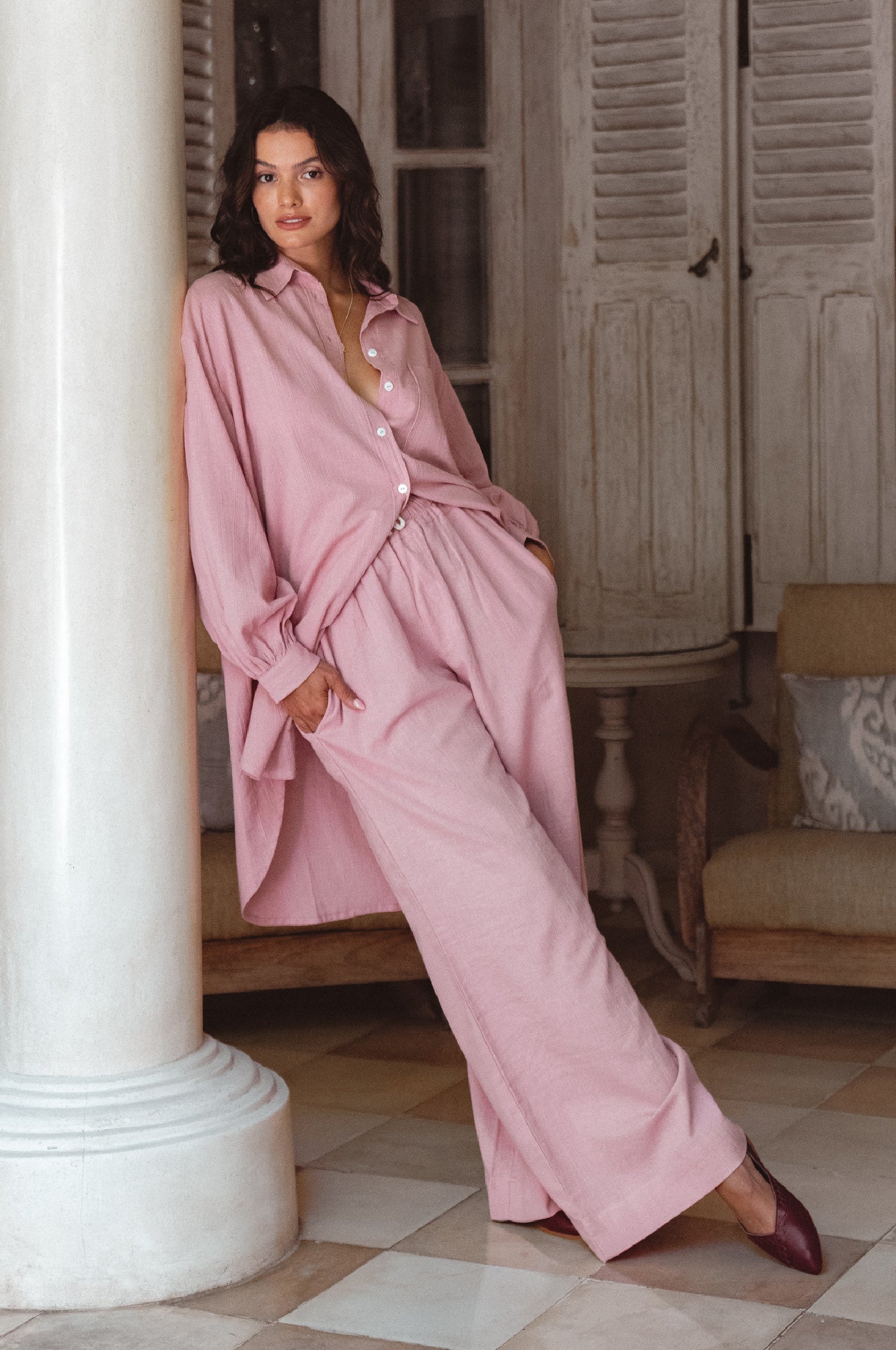 Calin Wide Leg Linen Pants in a chic wide-leg silhouette, featuring a high-rise elasticated waist and dual pockets, perfect for casual outings.