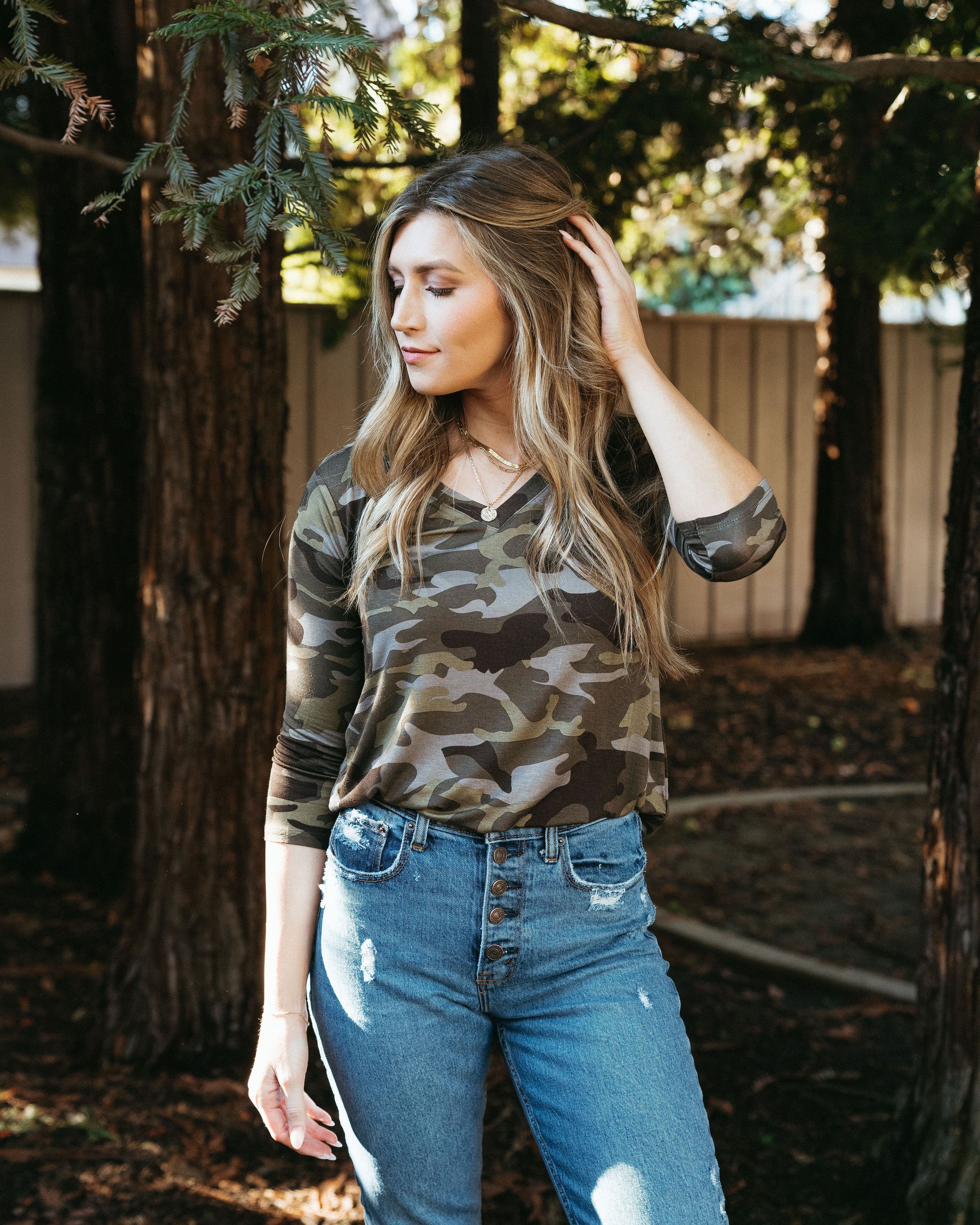 Camo 3/4 sleeve top in green, featuring a stylish camo print and comfortable fit, perfect for layering in spring.