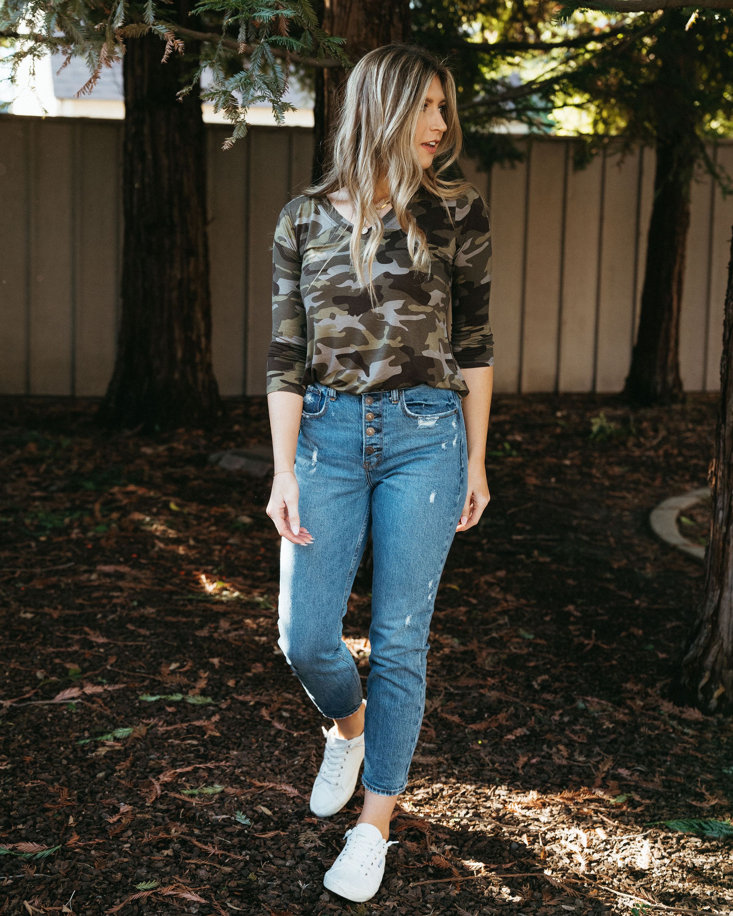 Camo 3/4 sleeve top in green, featuring a stylish camo print and comfortable fit, perfect for layering in spring.