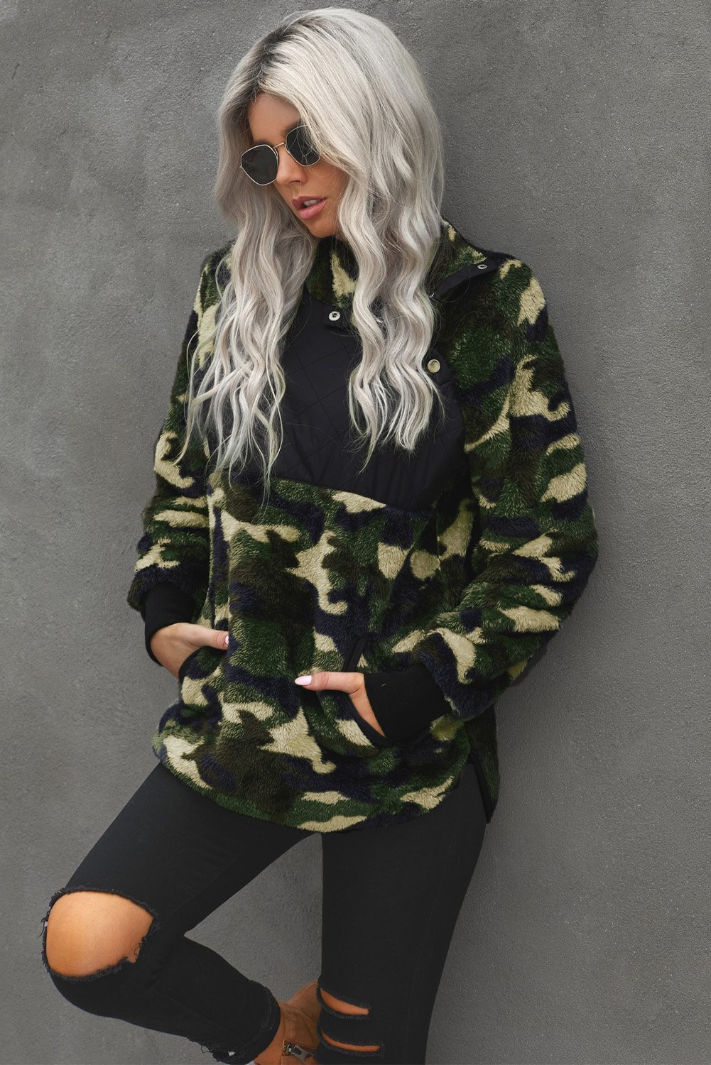 Camo Print Sherpa Pullover Sweatshirt featuring a high neck and kangaroo pocket, designed for warmth and style.