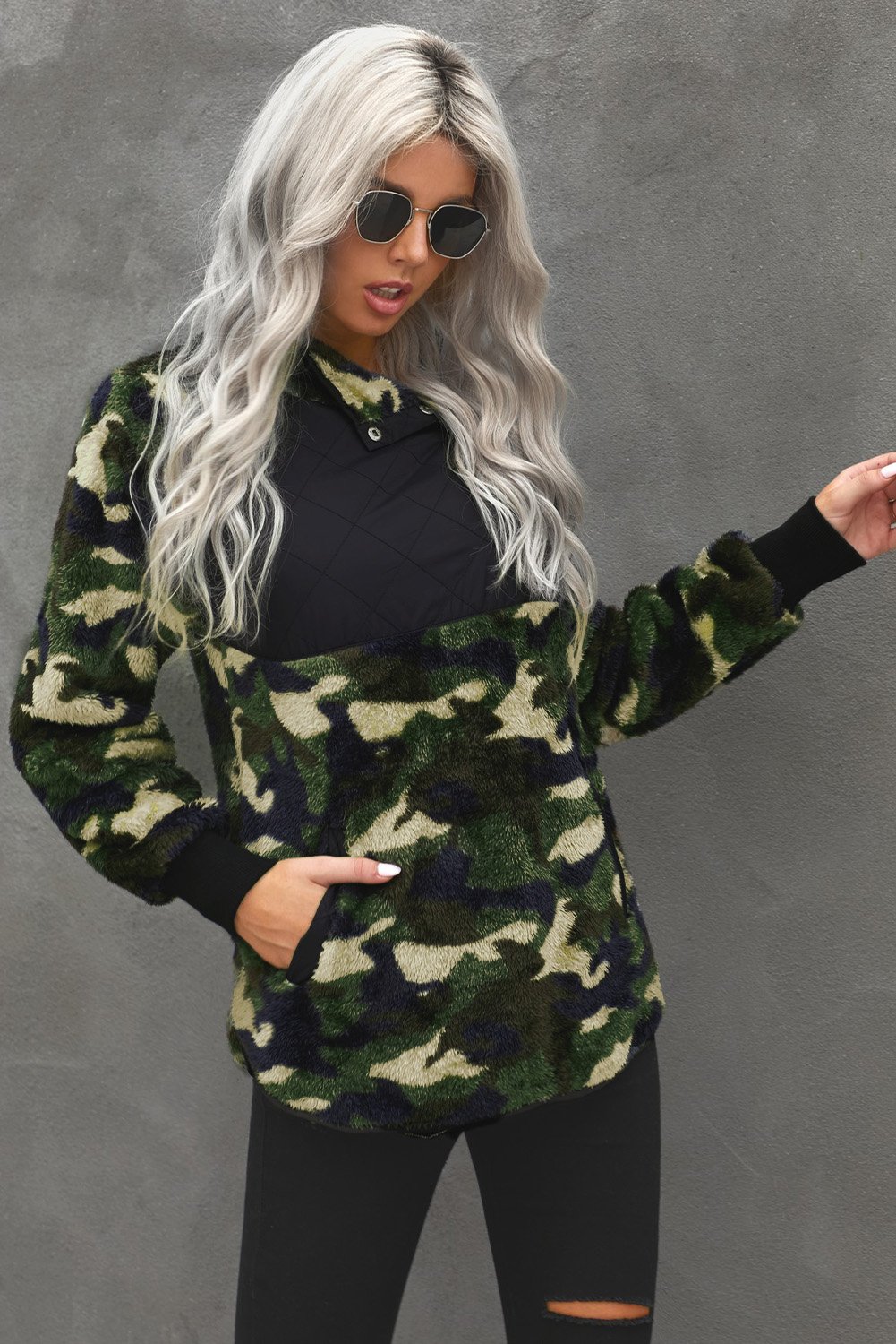 Camo Print Sherpa Pullover Sweatshirt featuring a high neck and kangaroo pocket, designed for warmth and style.