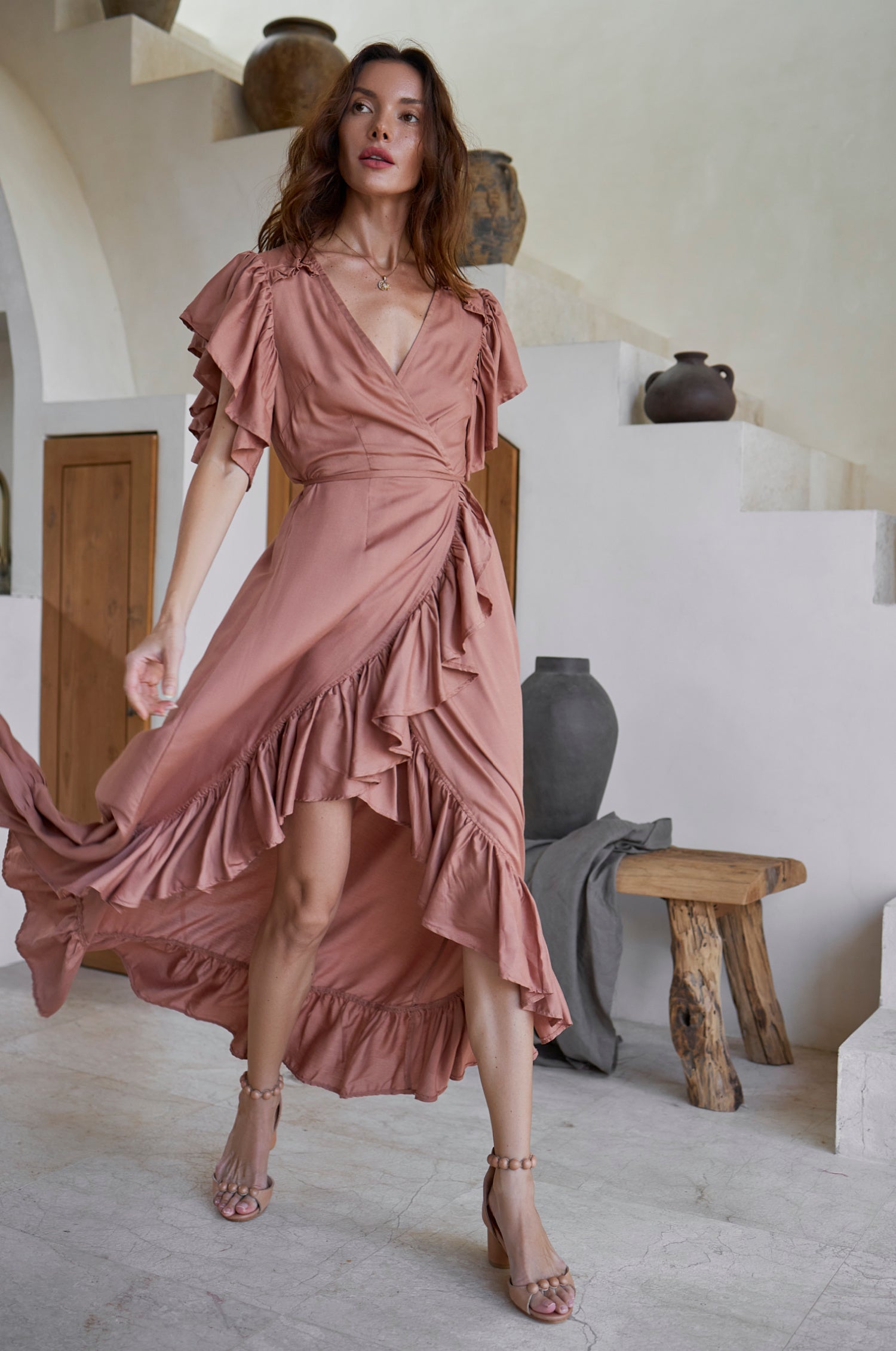 Carmen Wrap Maxi Dress featuring a soft rayon fabric, frilled hem, and a self-fabric tie at the waist, perfect for stylish occasions.