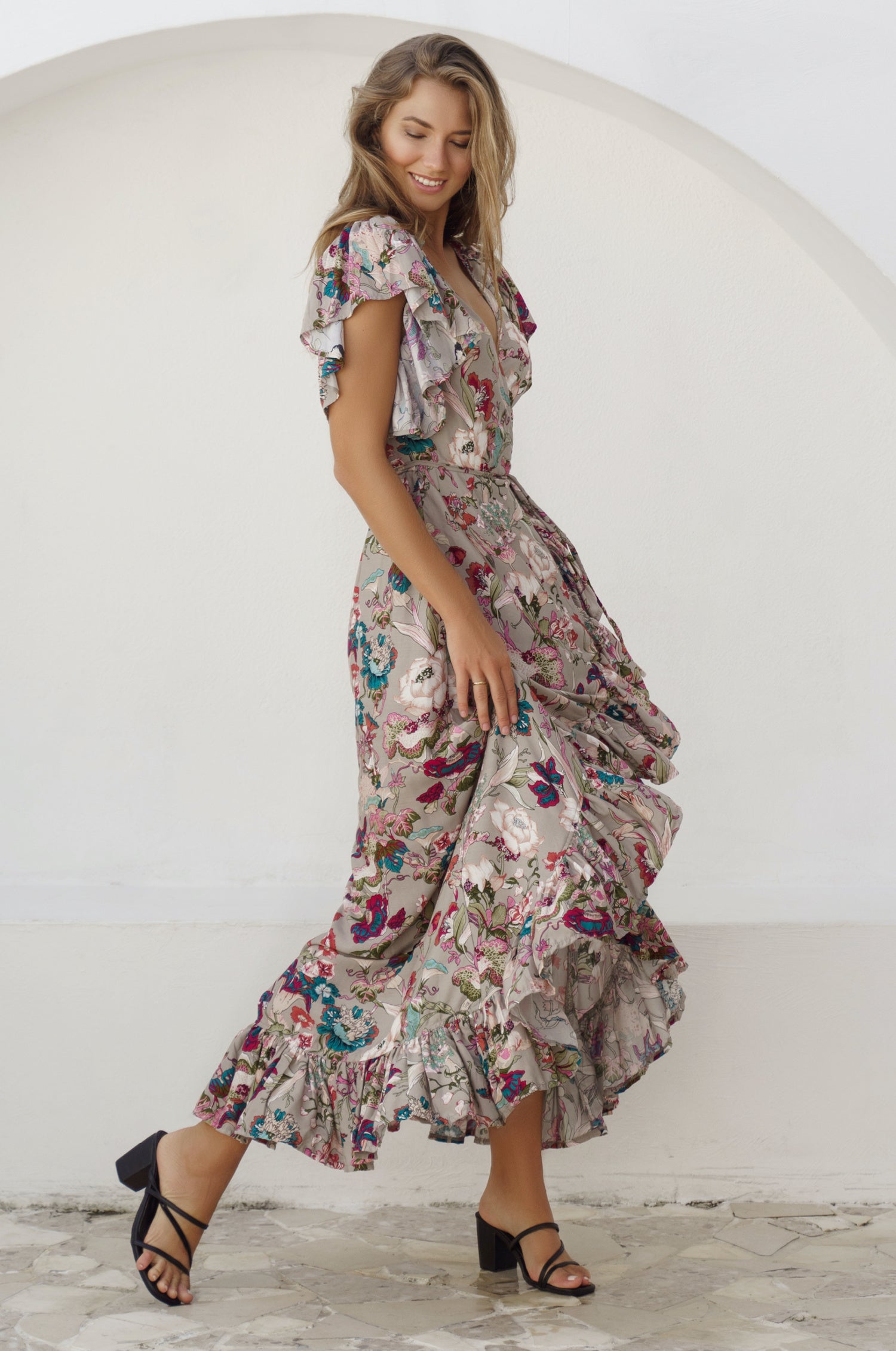 Carmen Wrap Maxi Dress in soft rayon fabric with a leg-split design, featuring a frilled hem and self-tie waist.