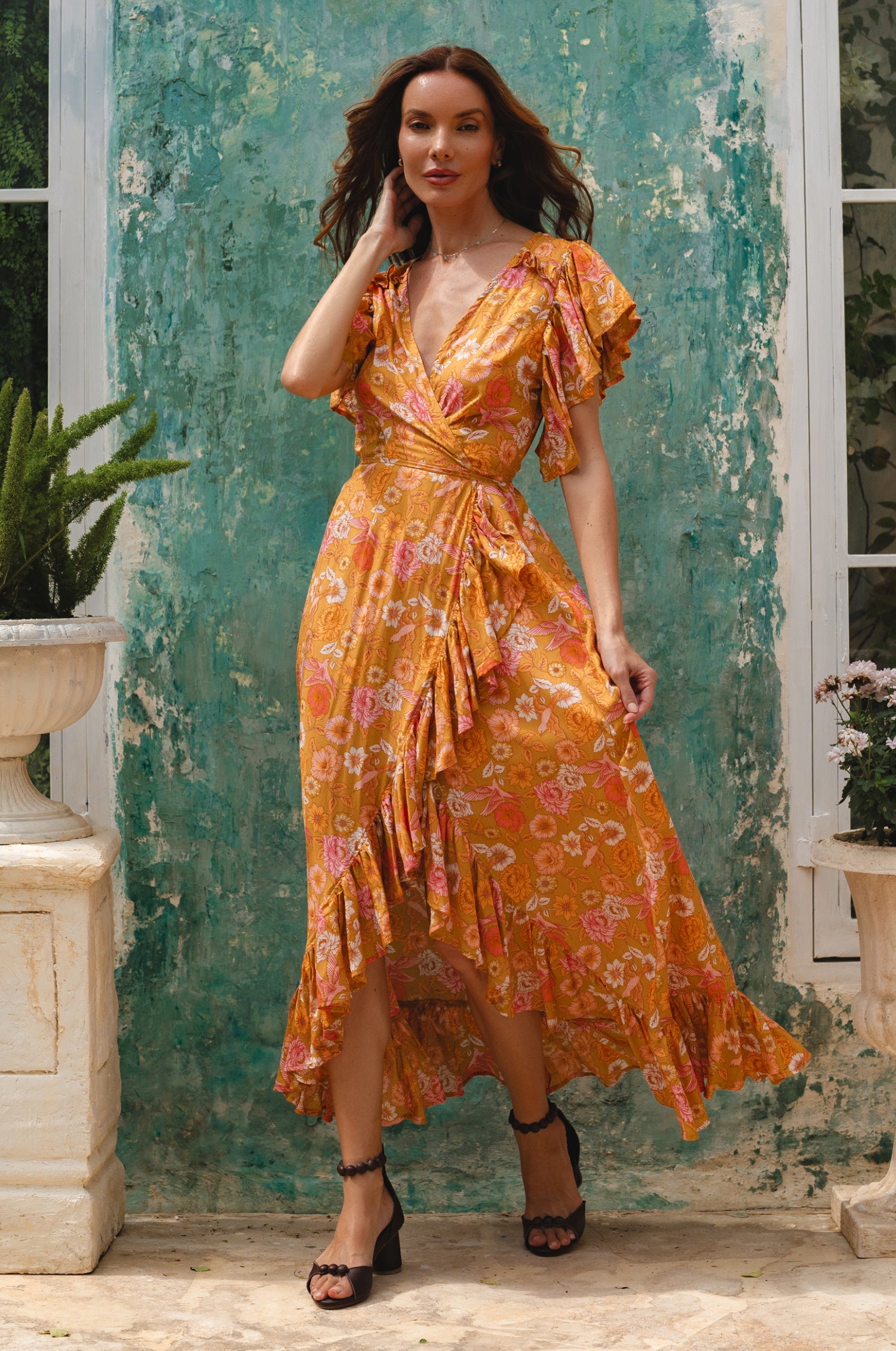 Carmen Wrap Maxi Dress in soft rayon fabric with a leg-split design, featuring a frilled hem and self-tie waist.