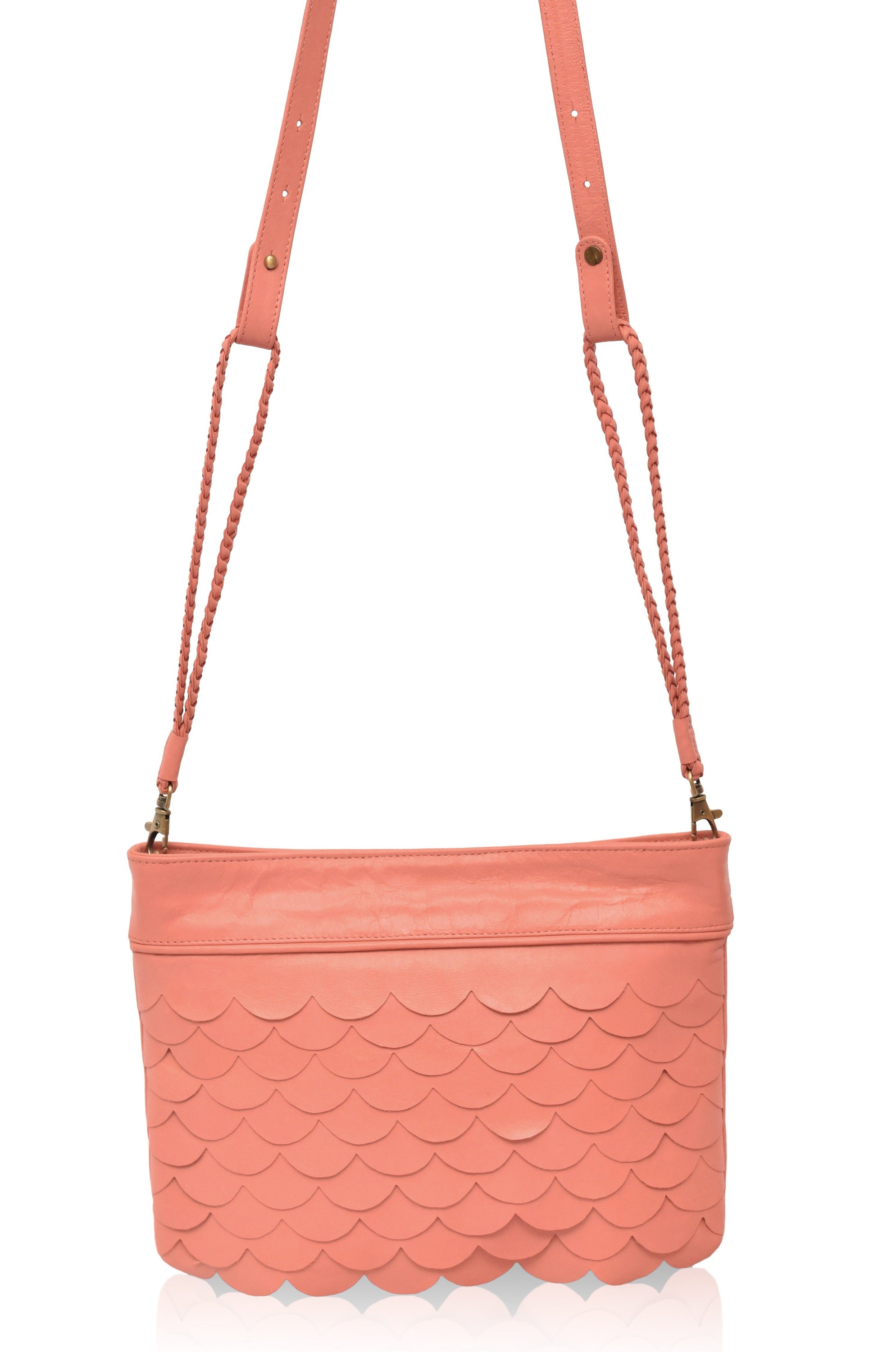 A stylish Cascade Crossbody Clutch featuring scallop-shaped leather layers, perfect for evening outings and casual wear.