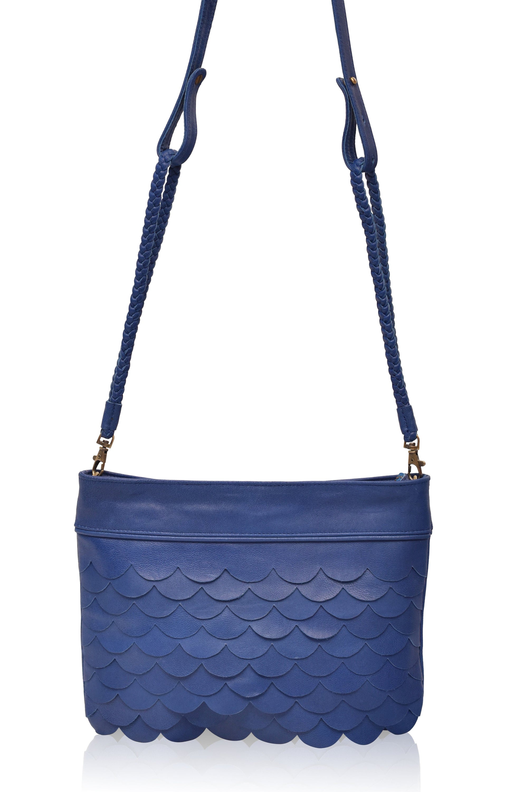 A stylish Cascade Crossbody Clutch featuring scallop-shaped leather layers, perfect for evening outings and casual wear.