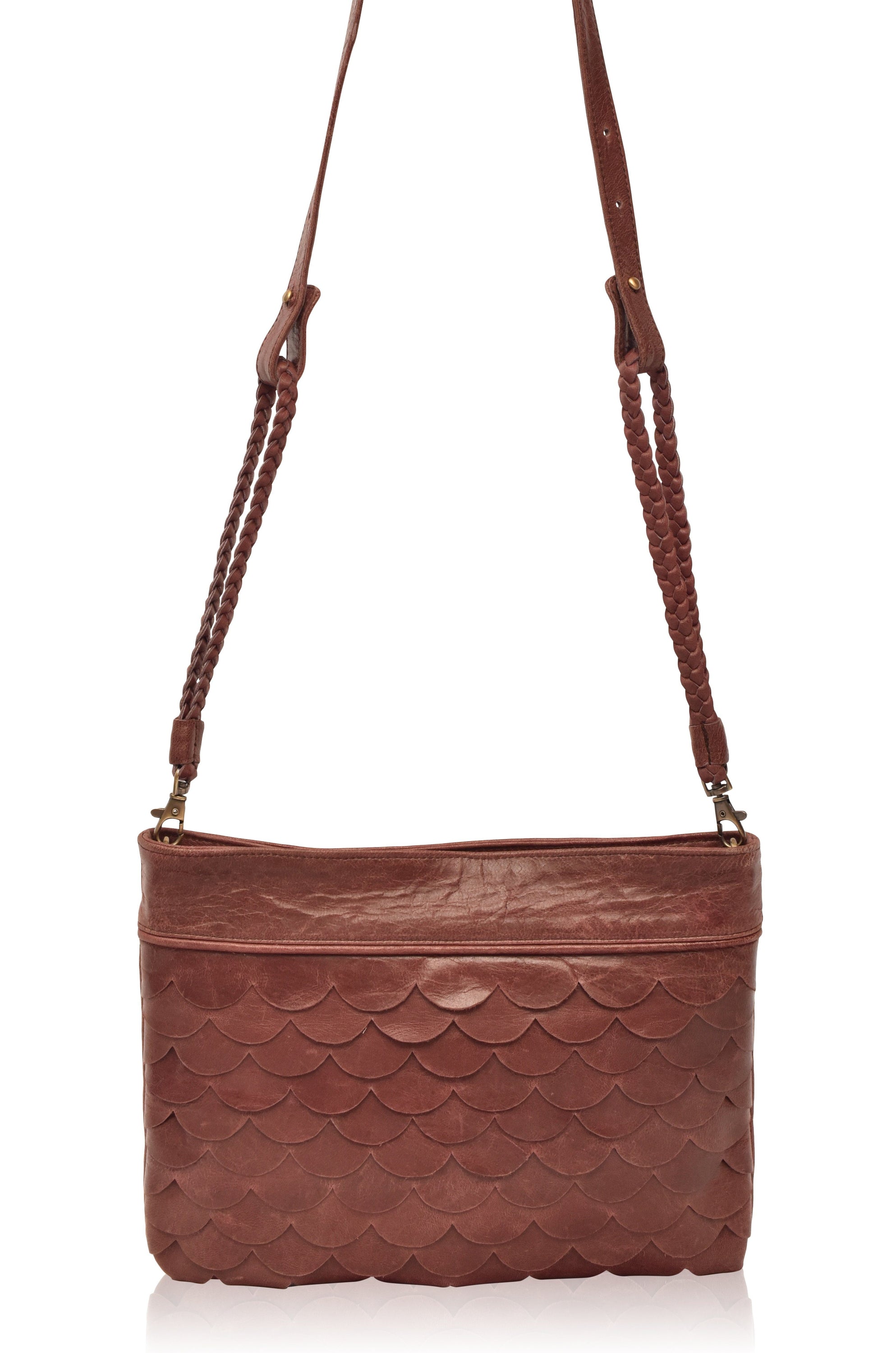 A stylish Cascade Crossbody Clutch featuring scallop-shaped leather layers, perfect for evening outings and casual wear.