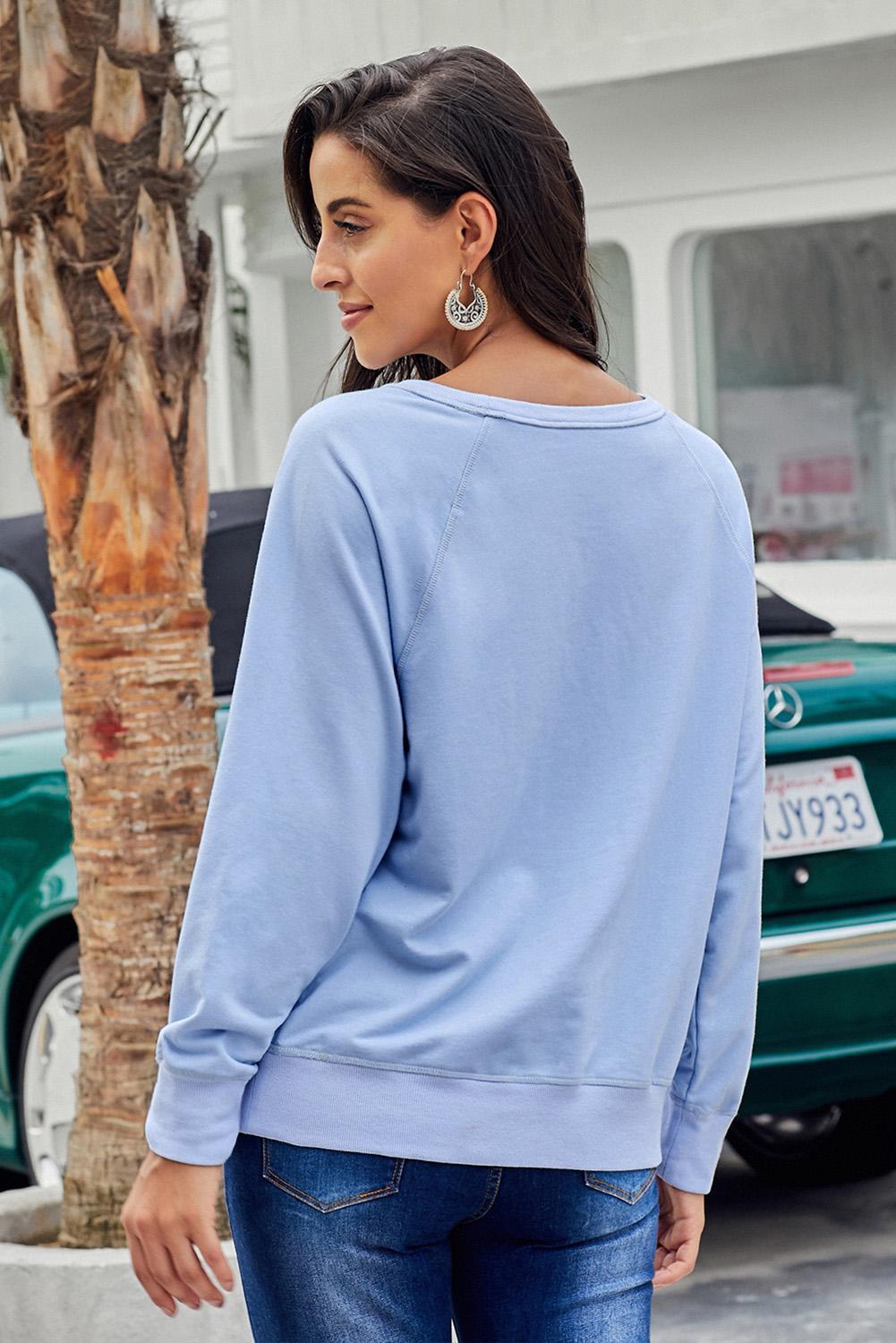 Casual sky blue French terry cotton blend pullover sweatshirt with crew neckline and distressed detailing, perfect for relaxed styling.