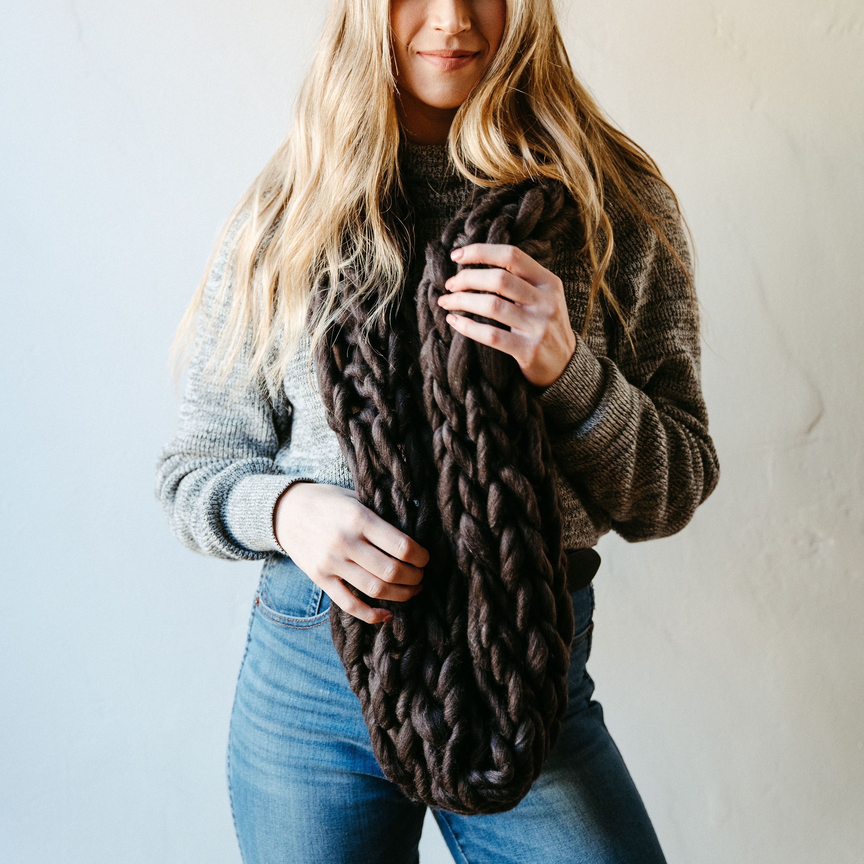 Charcoal Thick Knit Infinity Scarf displayed elegantly, showcasing its soft texture and cozy design, perfect for winter wear.