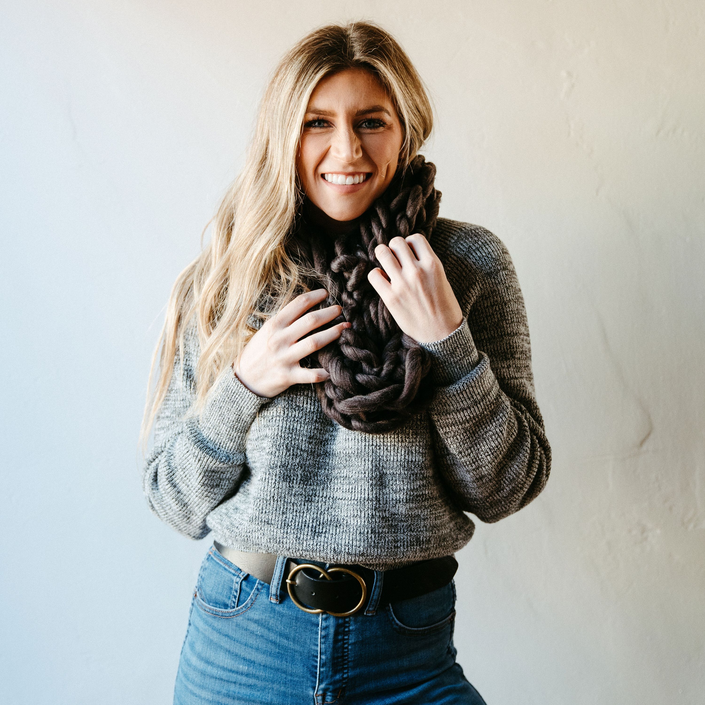 Charcoal Thick Knit Infinity Scarf displayed elegantly, showcasing its soft texture and cozy design, perfect for winter wear.