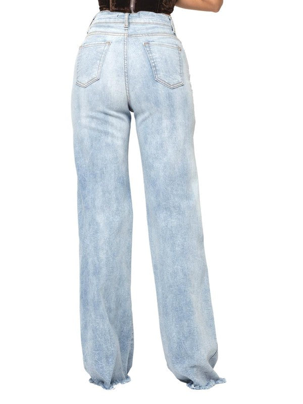 CHARLOTTE Wide Leg Jean in Light Denim featuring stone wash detail and raw hem, showcasing front and back pockets.