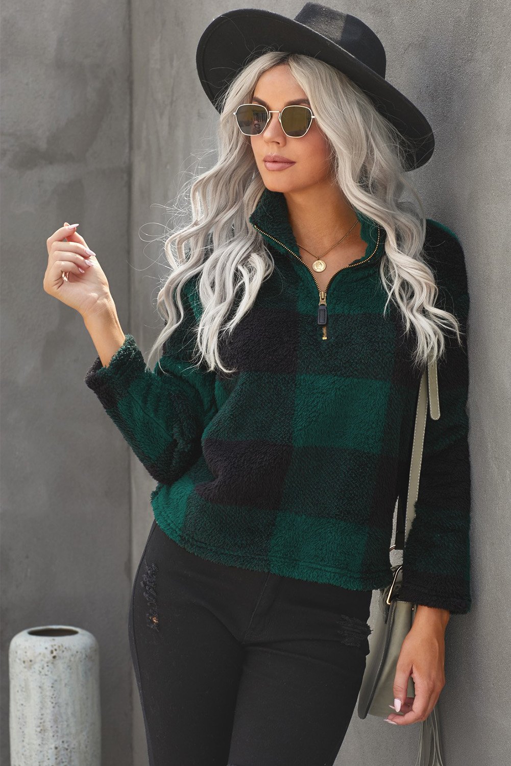 A stylish Checkered Half Zip Pullover featuring a trendy buffalo check print, standing collar, and cozy fabric, perfect for cold weather.