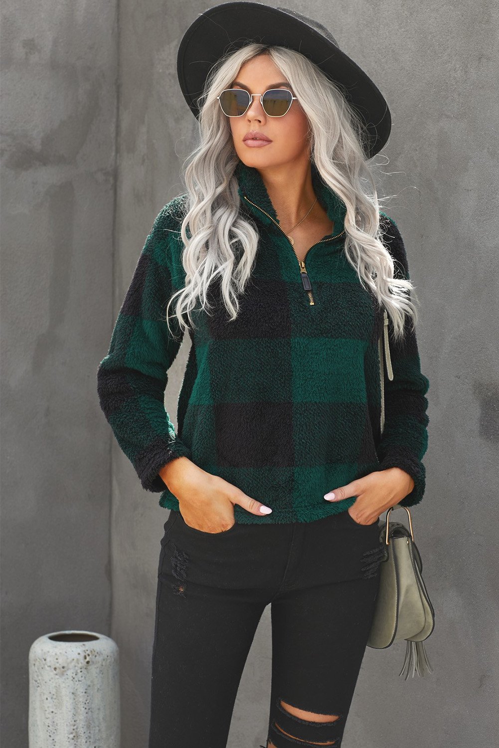 A stylish Checkered Half Zip Pullover featuring a trendy buffalo check print, standing collar, and cozy fabric, perfect for cold weather.