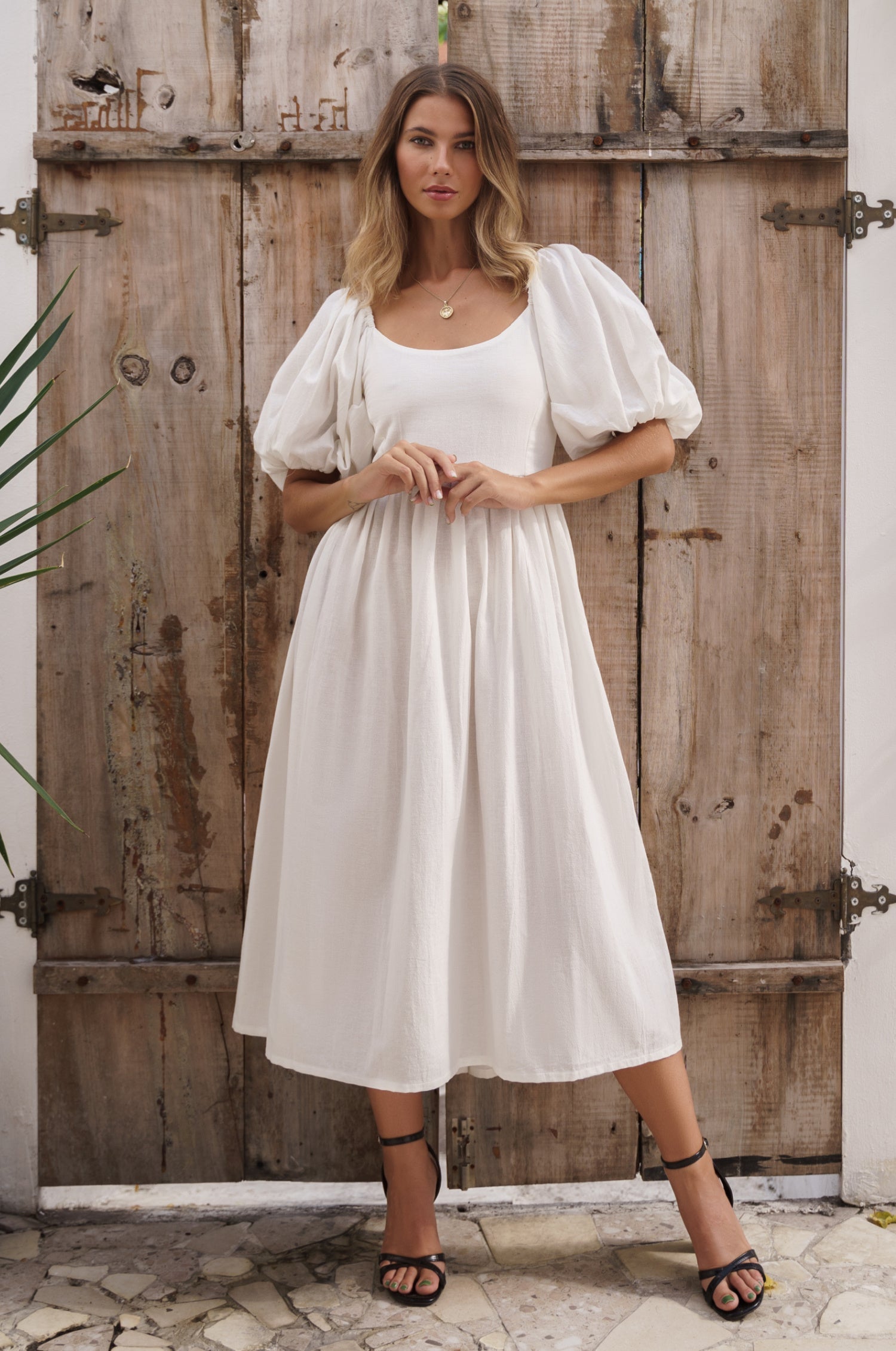 Cherie Puff Sleeve Midi Dress in pure linen with gathered puff sleeves and an oval neckline, perfect for summer outings.