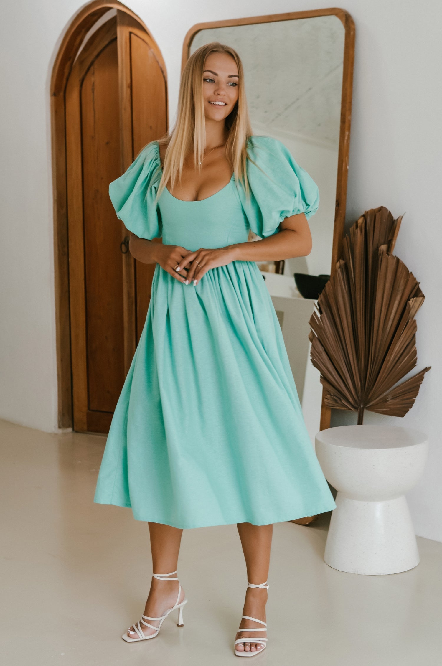 Cherie Puff Sleeve Midi Dress in pure linen with gathered puff sleeves and an oval neckline, perfect for summer outings.