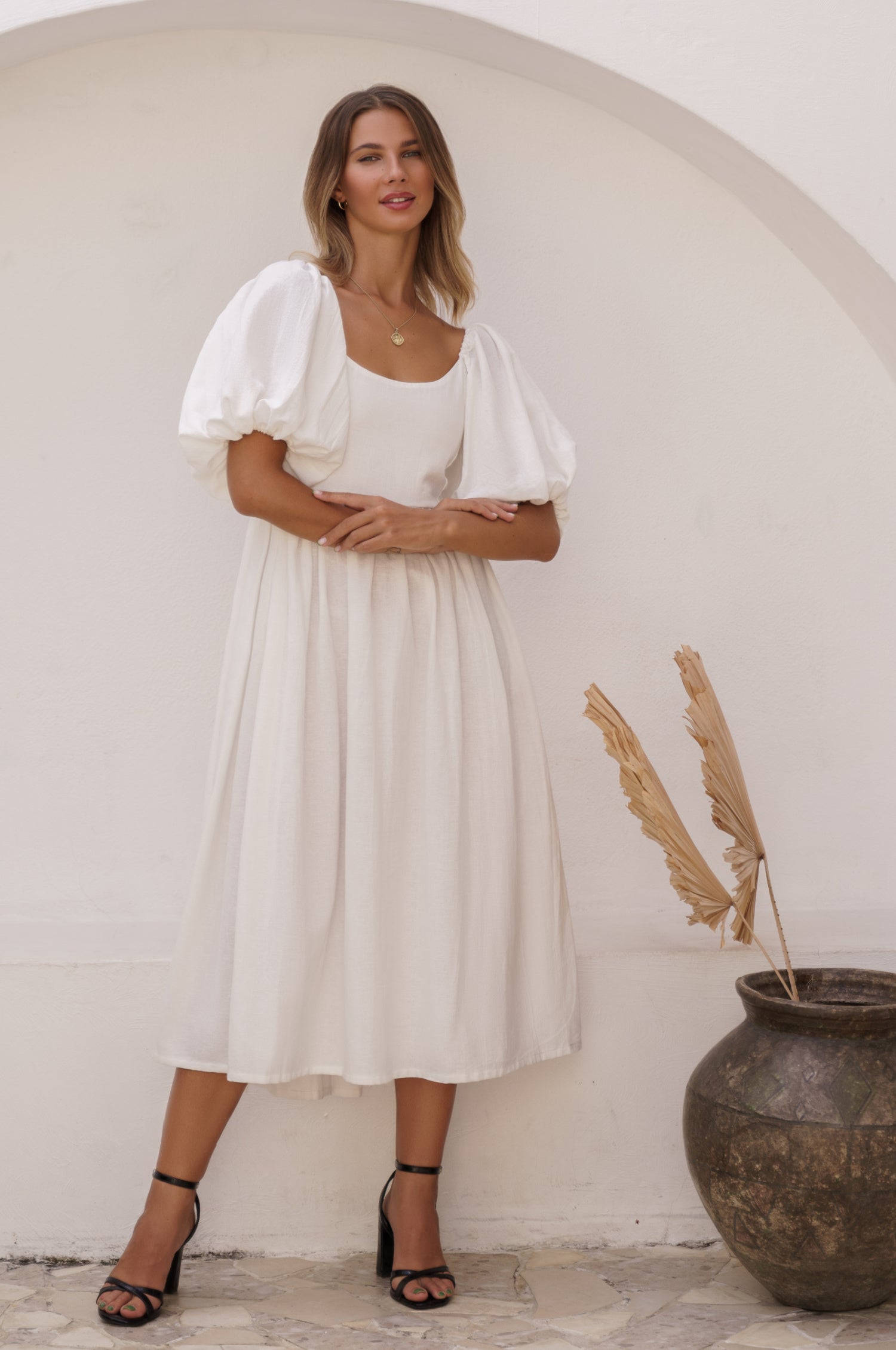 Cherie Puff Sleeve Midi Dress in pure linen with gathered puff sleeves and an oval neckline, perfect for summer outings.