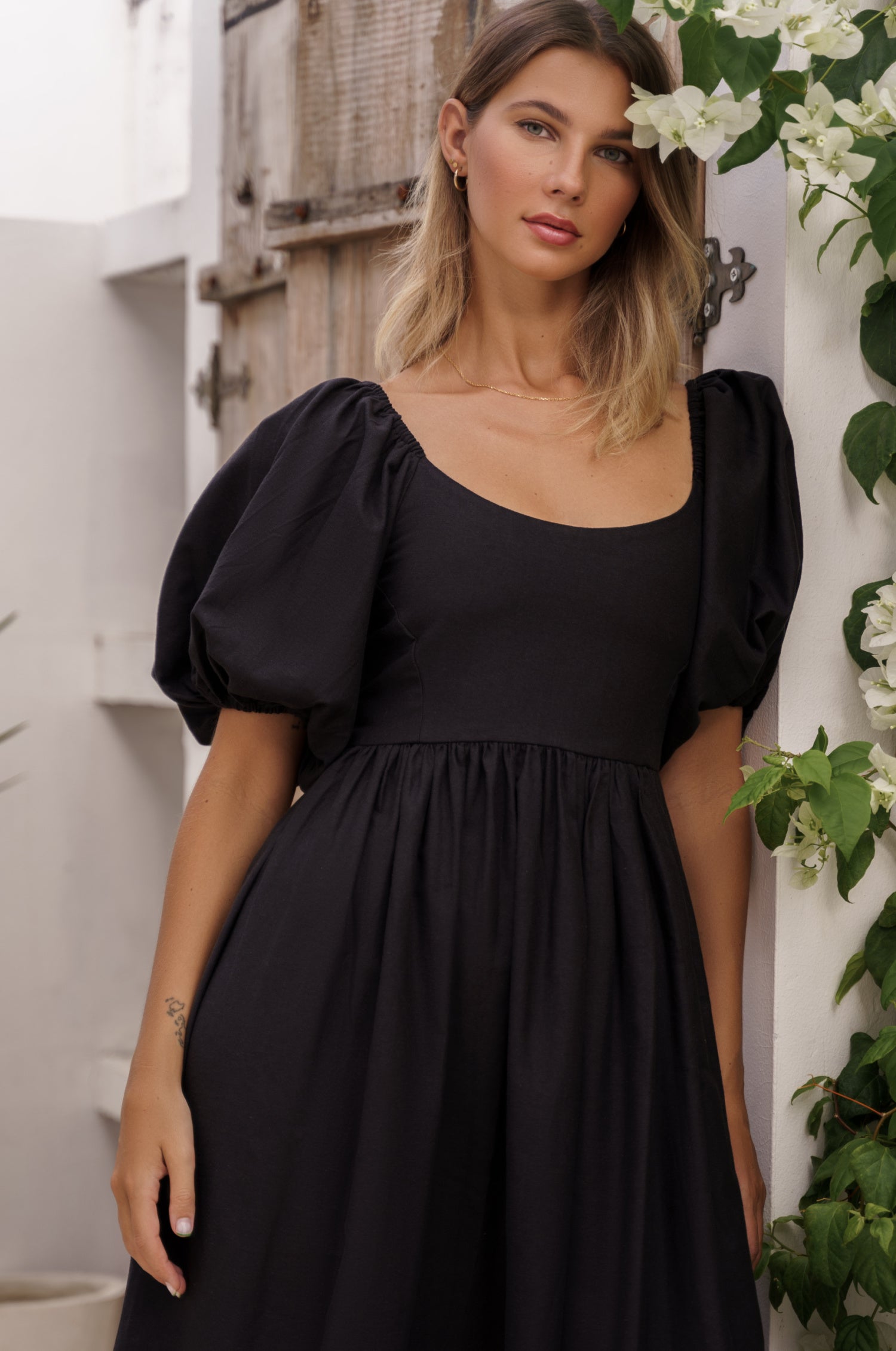 Cherie Puff Sleeve Midi Dress in pure linen with gathered puff sleeves and an oval neckline, perfect for summer outings.