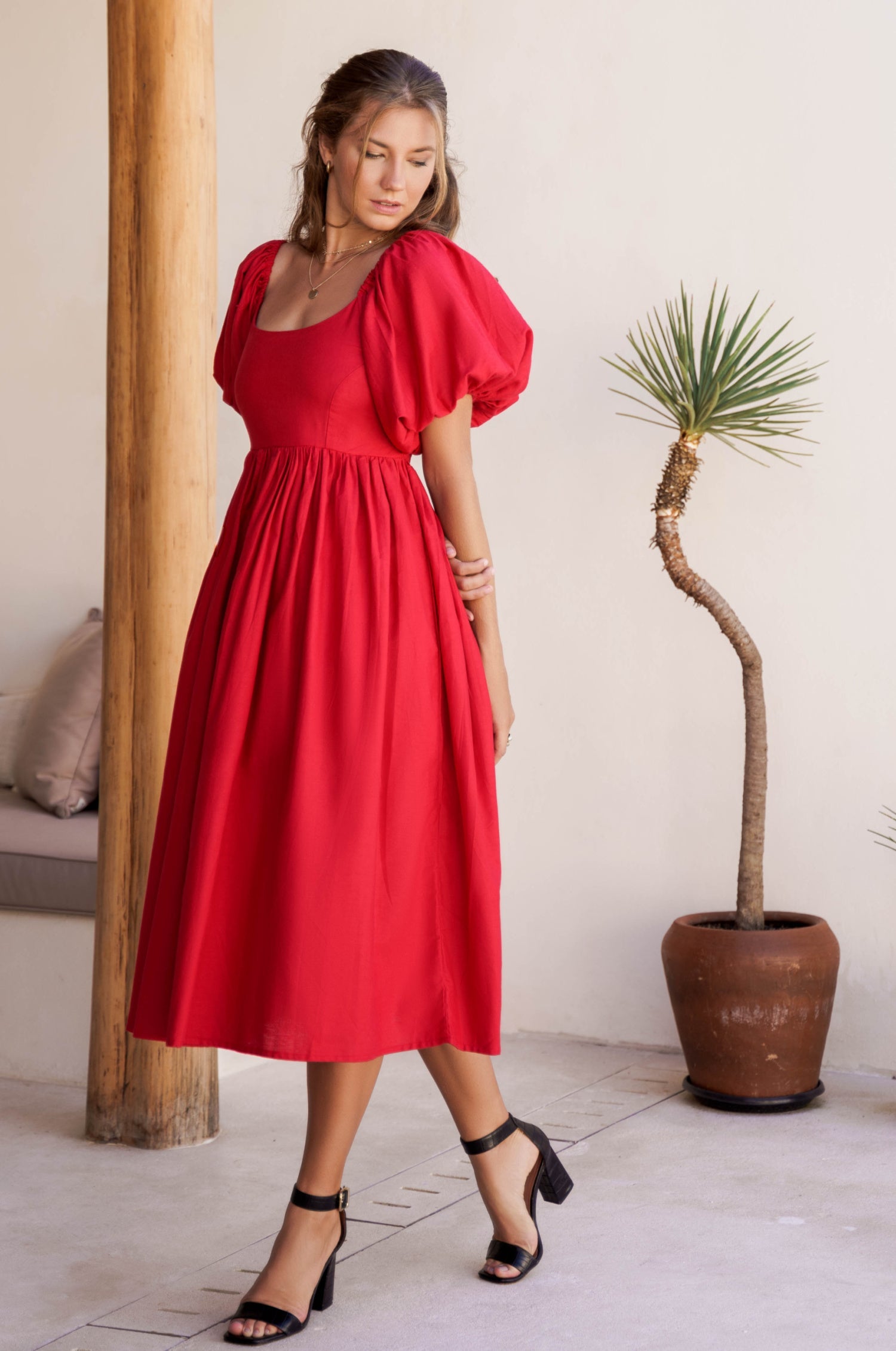 Cherie Puff Sleeve Midi Dress in pure linen with gathered puff sleeves and an oval neckline, perfect for summer outings.