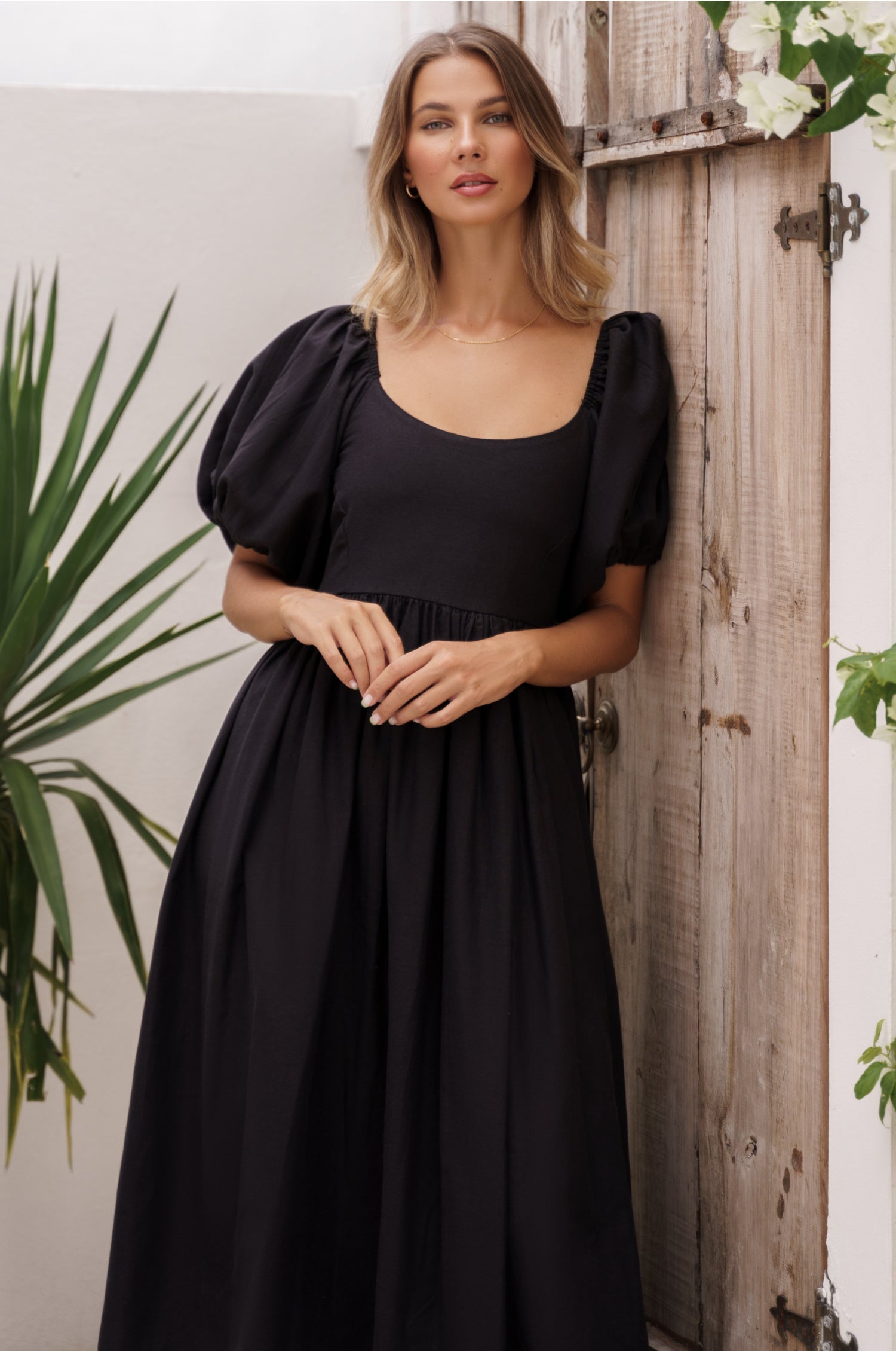 Cherie Puff Sleeve Midi Dress in pure linen with gathered puff sleeves and an oval neckline, perfect for summer outings.