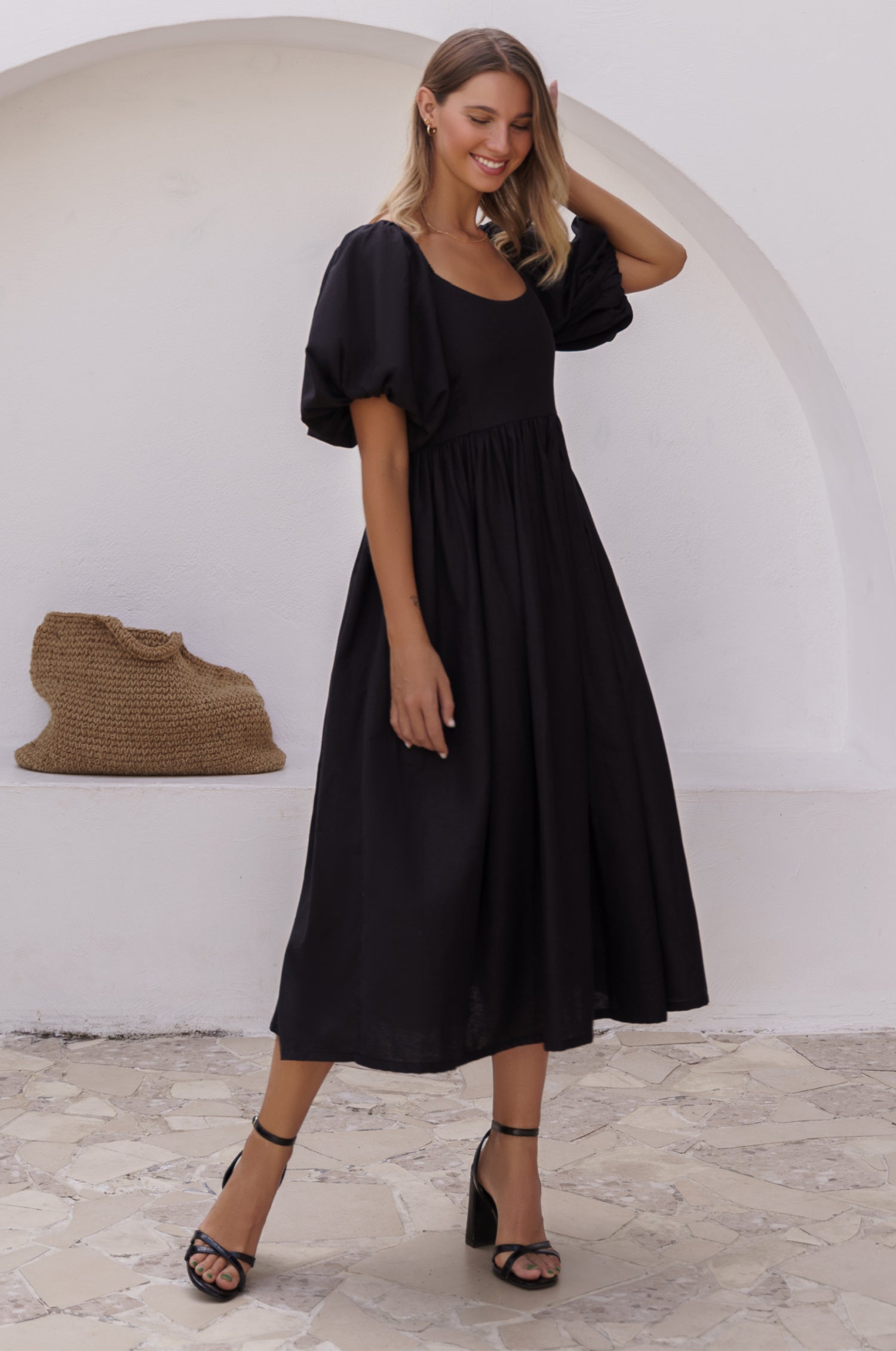 Cherie Puff Sleeve Midi Dress in pure linen with gathered puff sleeves and an oval neckline, perfect for summer outings.