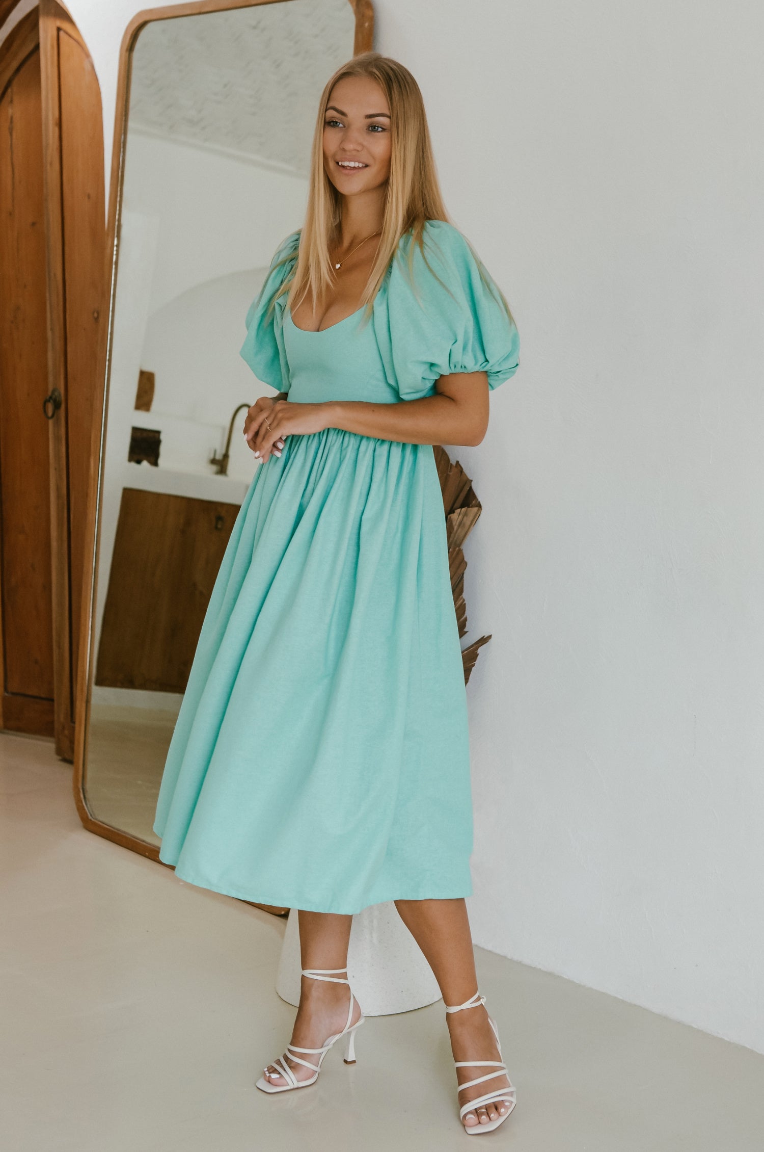 Cherie Puff Sleeve Midi Dress in pure linen with gathered puff sleeves and an oval neckline, perfect for summer outings.