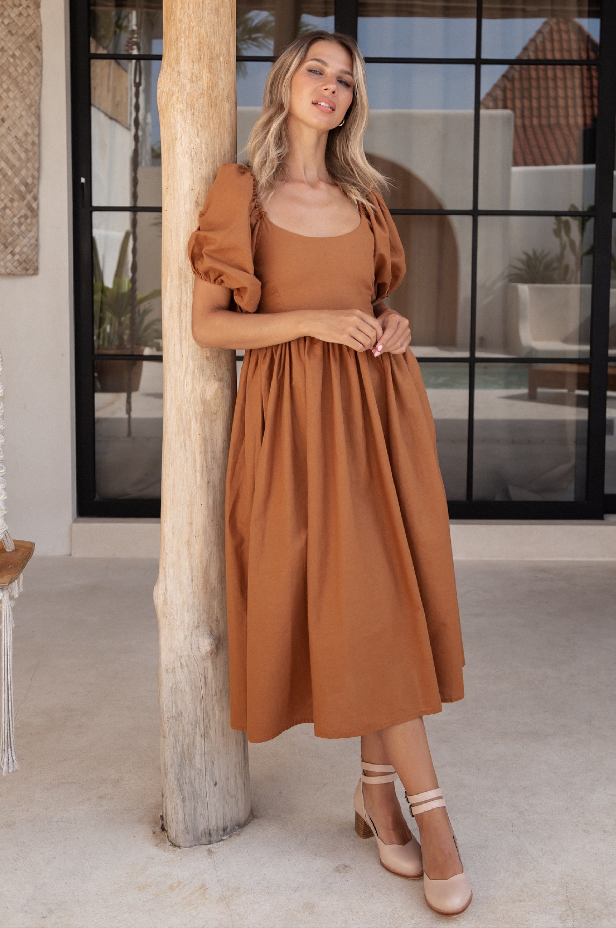 Cherie Puff Sleeve Midi Dress in pure linen with gathered puff sleeves and an oval neckline, perfect for summer outings.