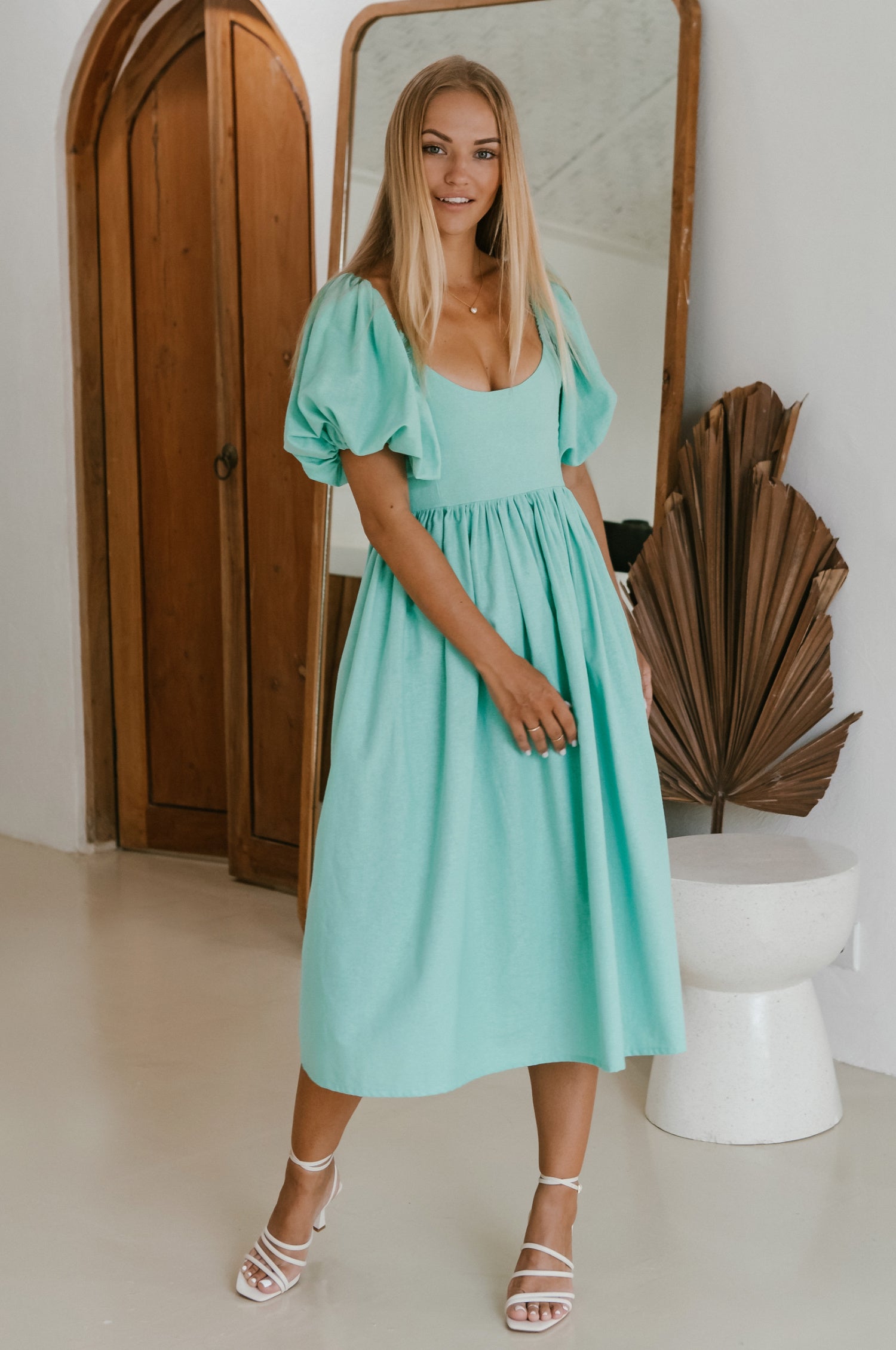 Cherie Puff Sleeve Midi Dress in pure linen with gathered puff sleeves and an oval neckline, perfect for summer outings.