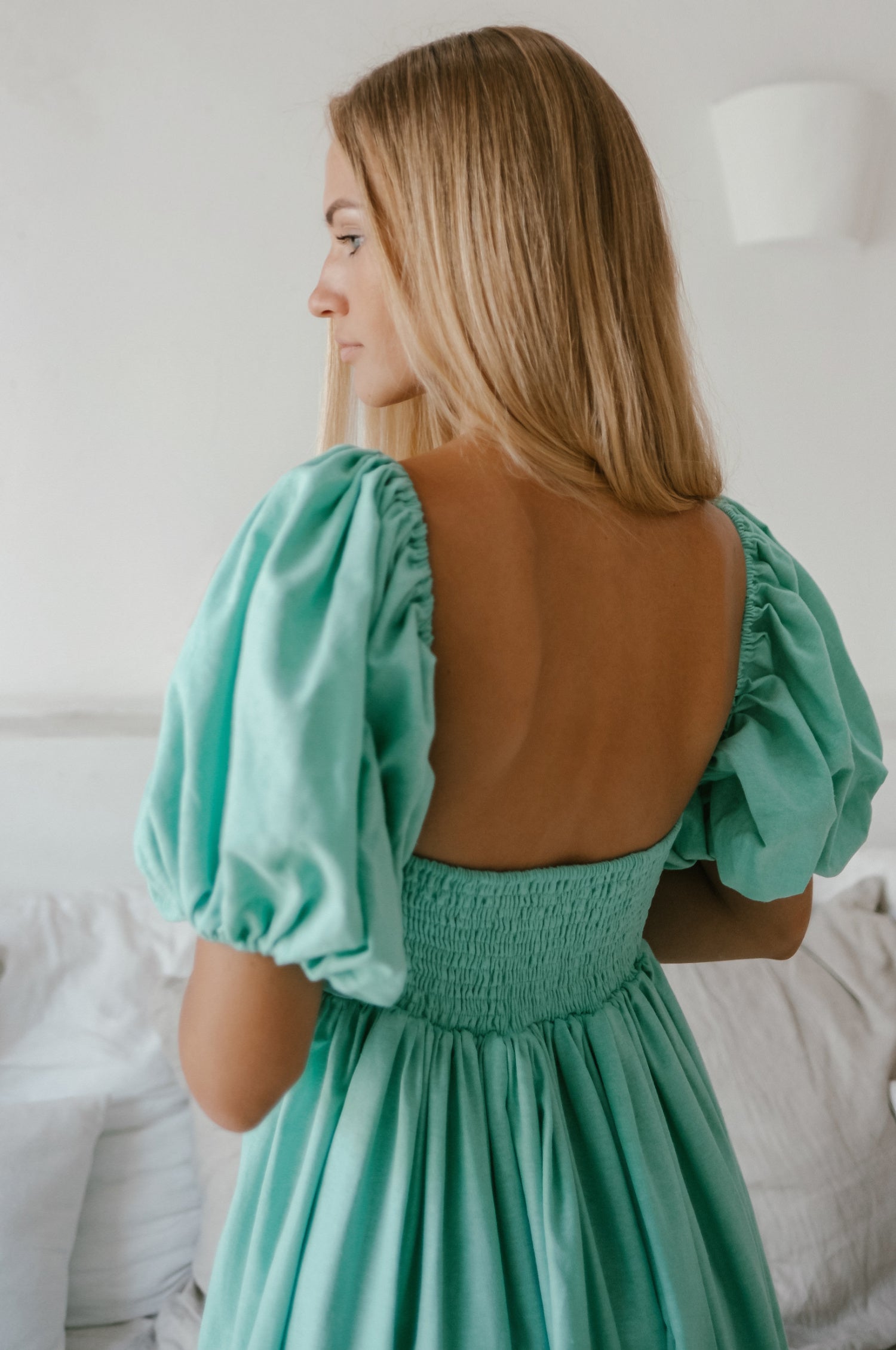 Cherie Puff Sleeve Midi Dress in pure linen featuring an oval neckline and gathered puff sleeves, perfect for summer outings.