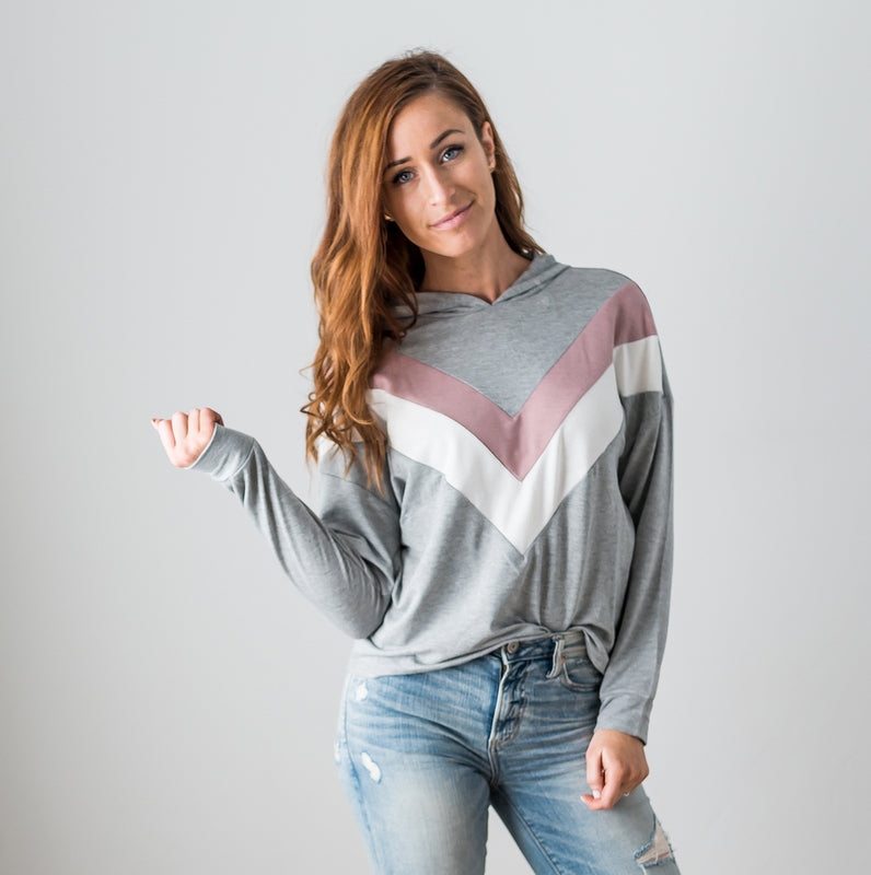 A vibrant Chevron Long Sleeve Top featuring a color blocked, chunky chevron design, perfect for casual wear.