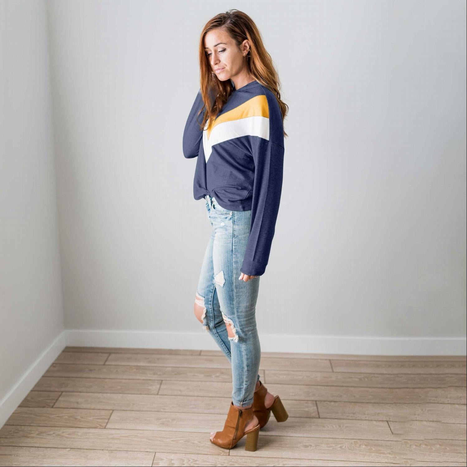 A vibrant Chevron Long Sleeve Top featuring a color blocked, chunky chevron design, perfect for casual wear.